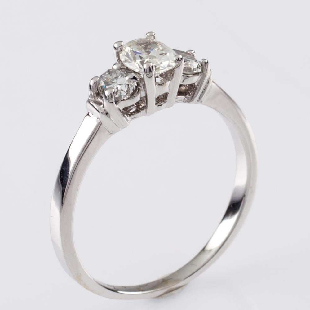 0.80 Carat Oval Cut Diamond Three-Stone 14 Karat White Gold Engagement Ring 1
