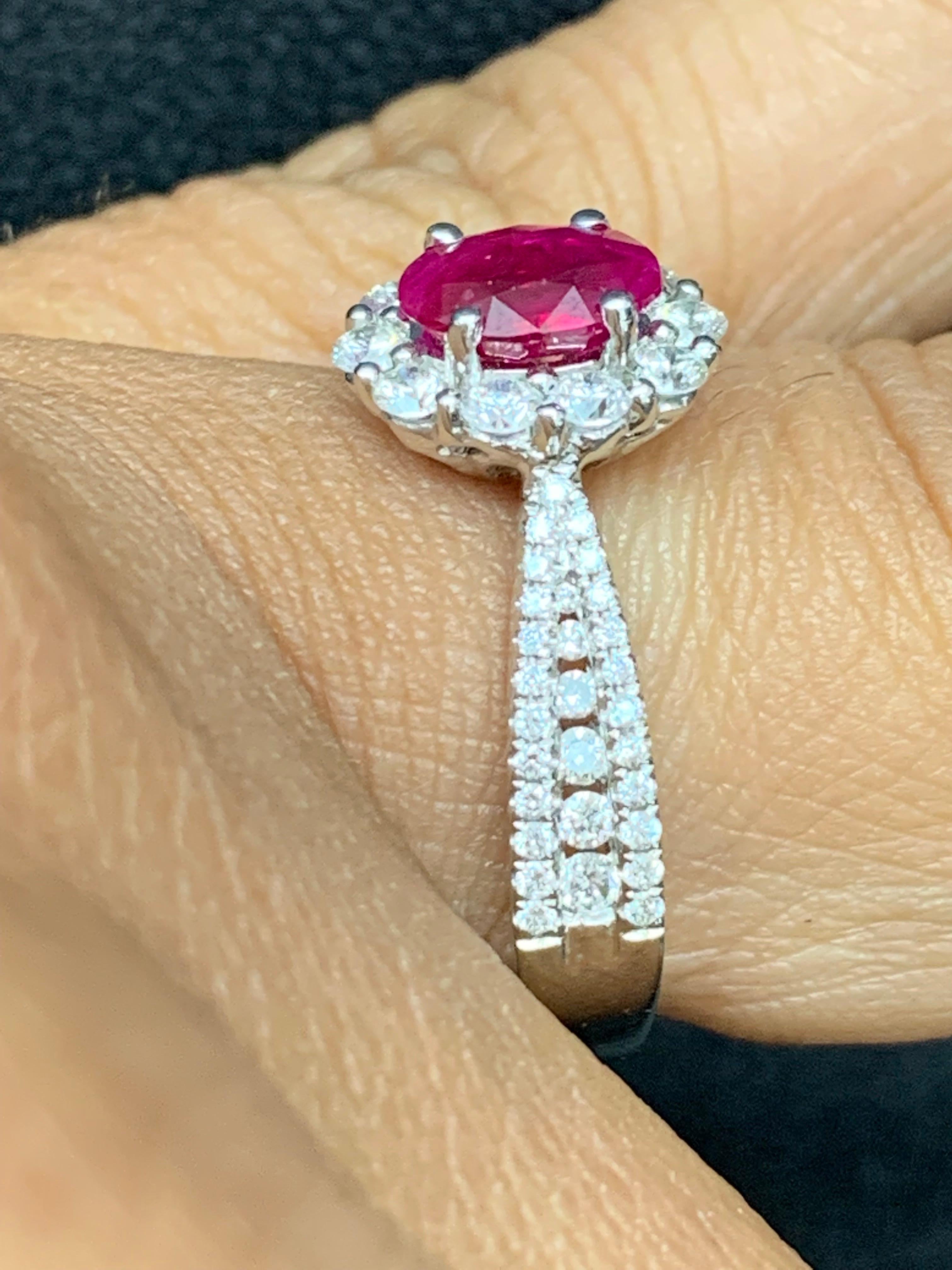 Modern 0.80 Carat Oval Cut Ruby and Diamond Engagement Ring in 18K White Gold For Sale