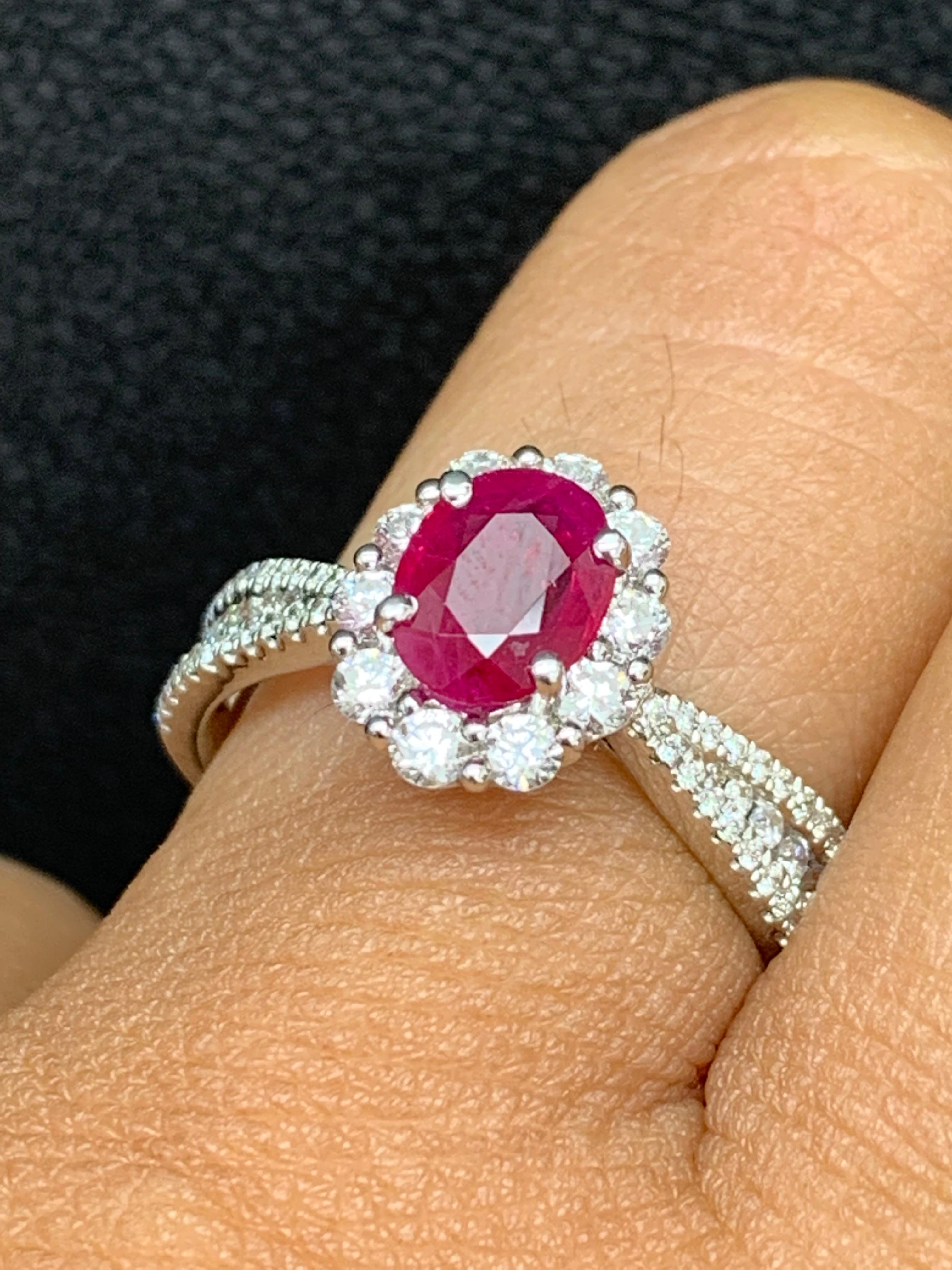 Women's 0.80 Carat Oval Cut Ruby and Diamond Engagement Ring in 18K White Gold For Sale