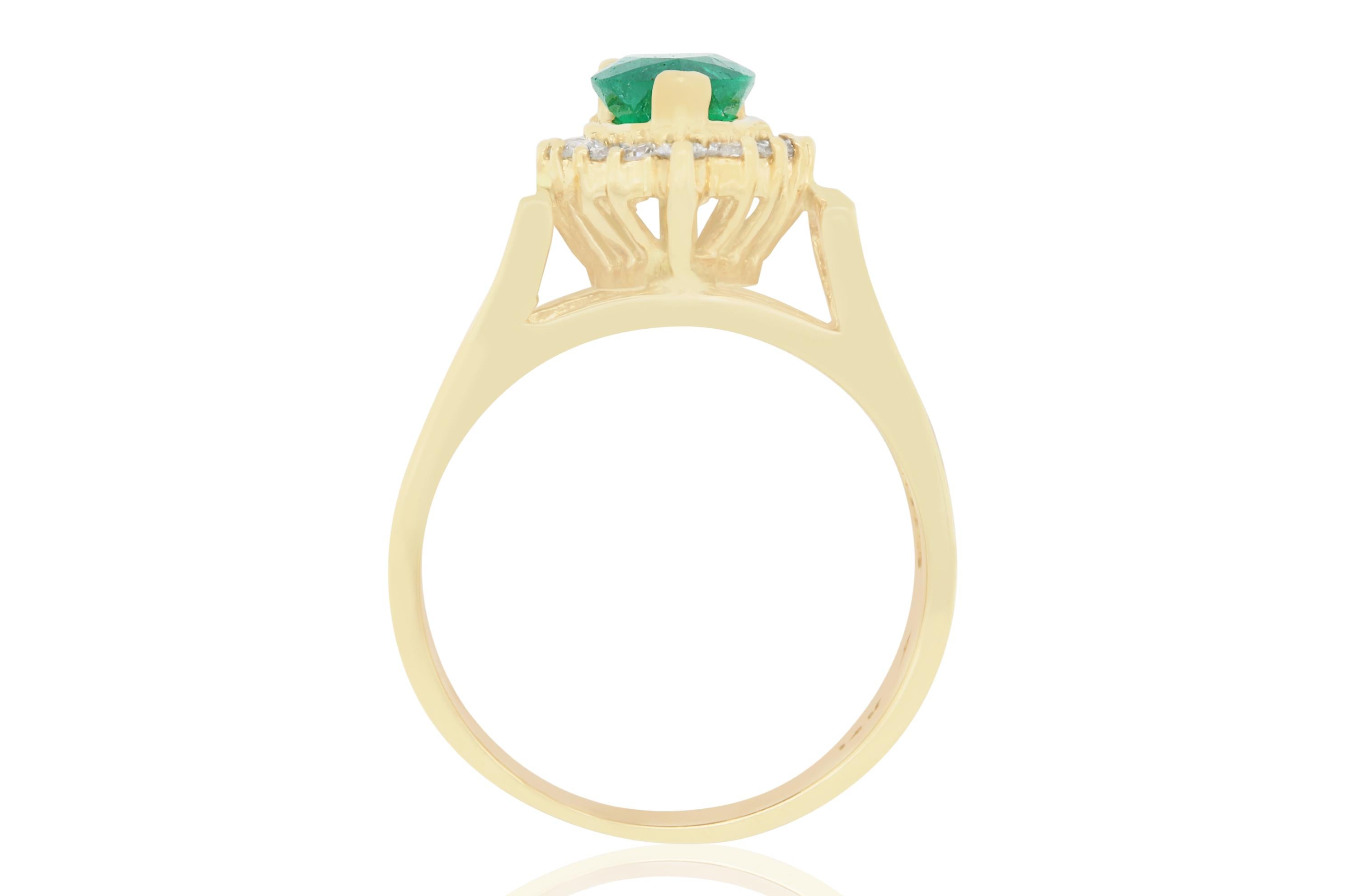 Contemporary 0.80 Carat Pear Shaped Emerald and 0.26 Carat White Diamond Ring