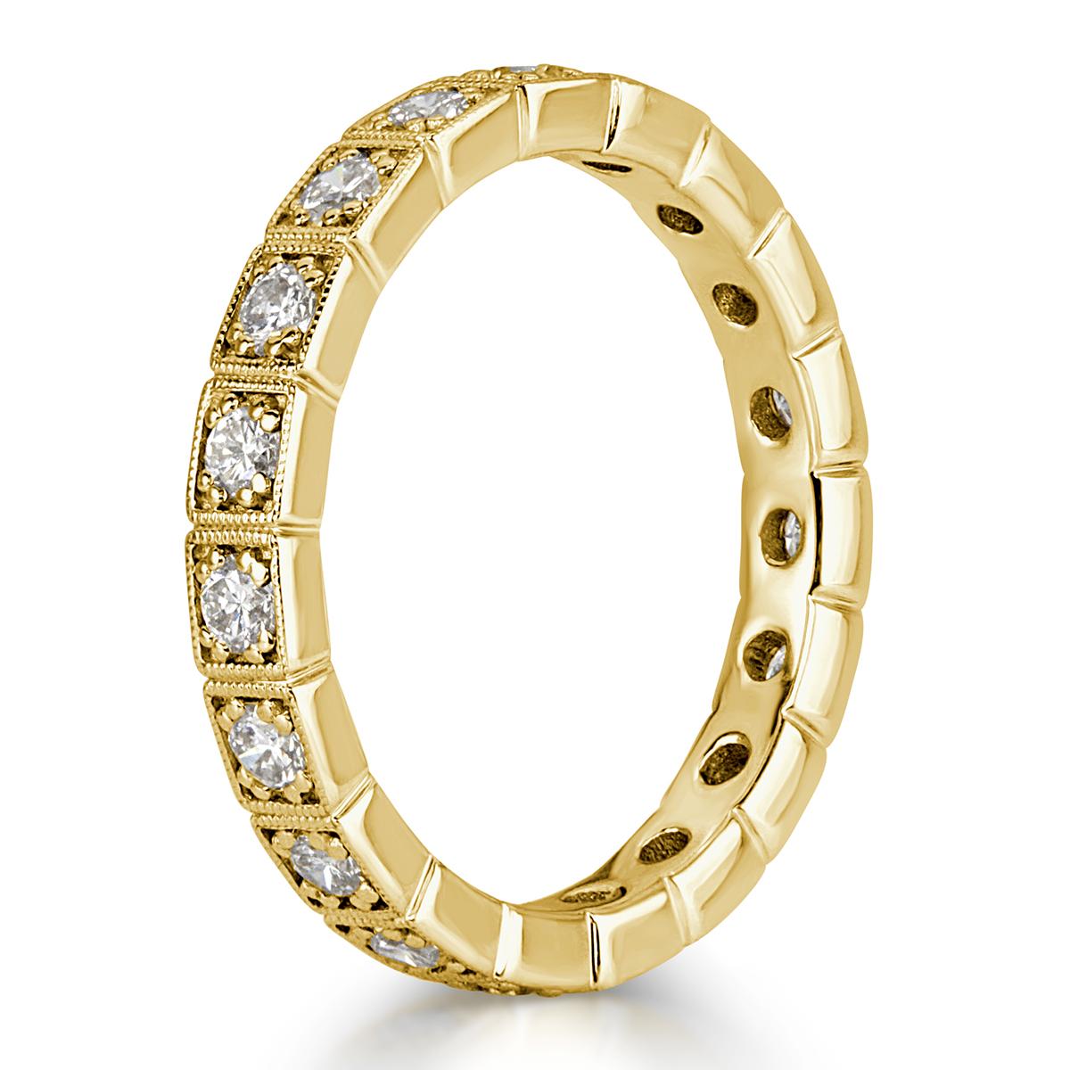 This exquisite diamond eternity band showcases 0.80ct of round brilliant cut diamonds bezel set to perfection in an 18k yellow gold, vintage setting style featuring delicate milgrain detail throughout, measuring at 2.9mm. The diamonds total 0.80ct