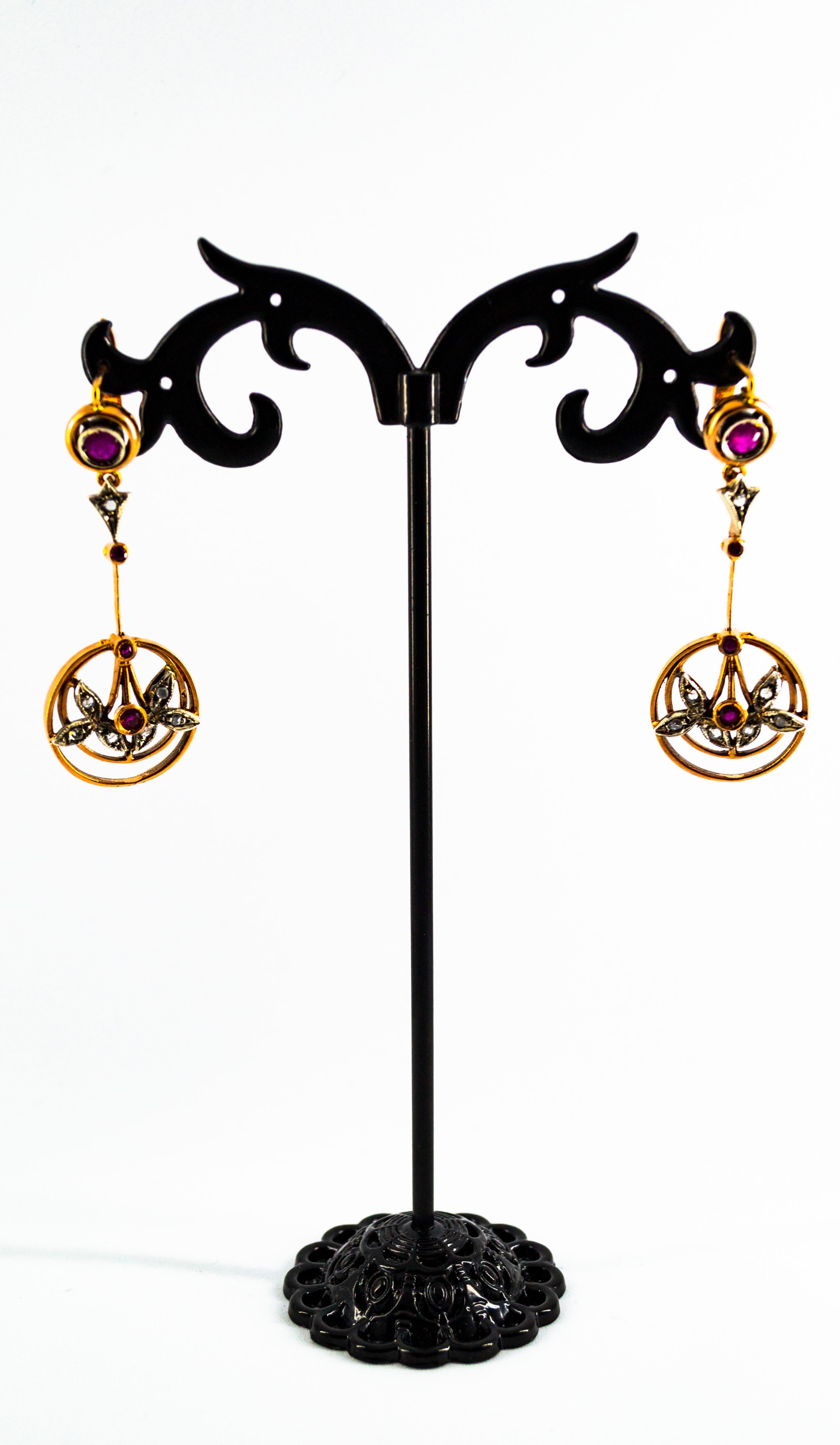 These Lever-Back Earrings are made of 9K Yellow Gold and Sterling Silver.
These Earrings have 0.10 Carats of White Rose Cut Diamonds.
These Earrings have also 0.70 Carat of Rubies.
These Earrings are available also with Emeralds or Blue