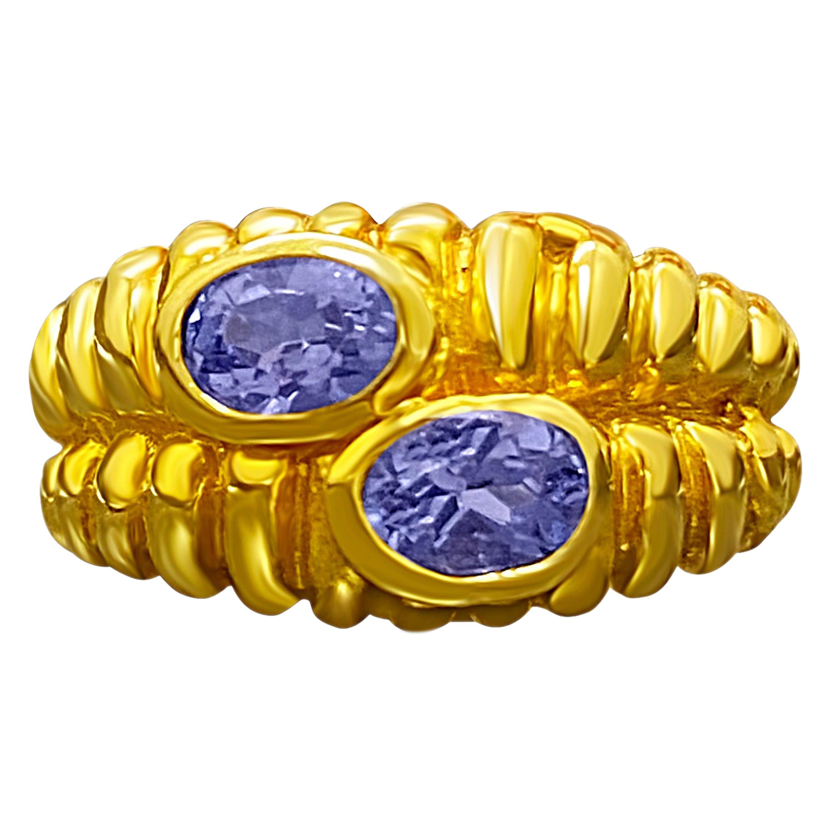 0.80 Carat Tanzanite "Toi Et Moi" 14 Karat Yellow Gold Oval Cut Engagement Ring For Sale