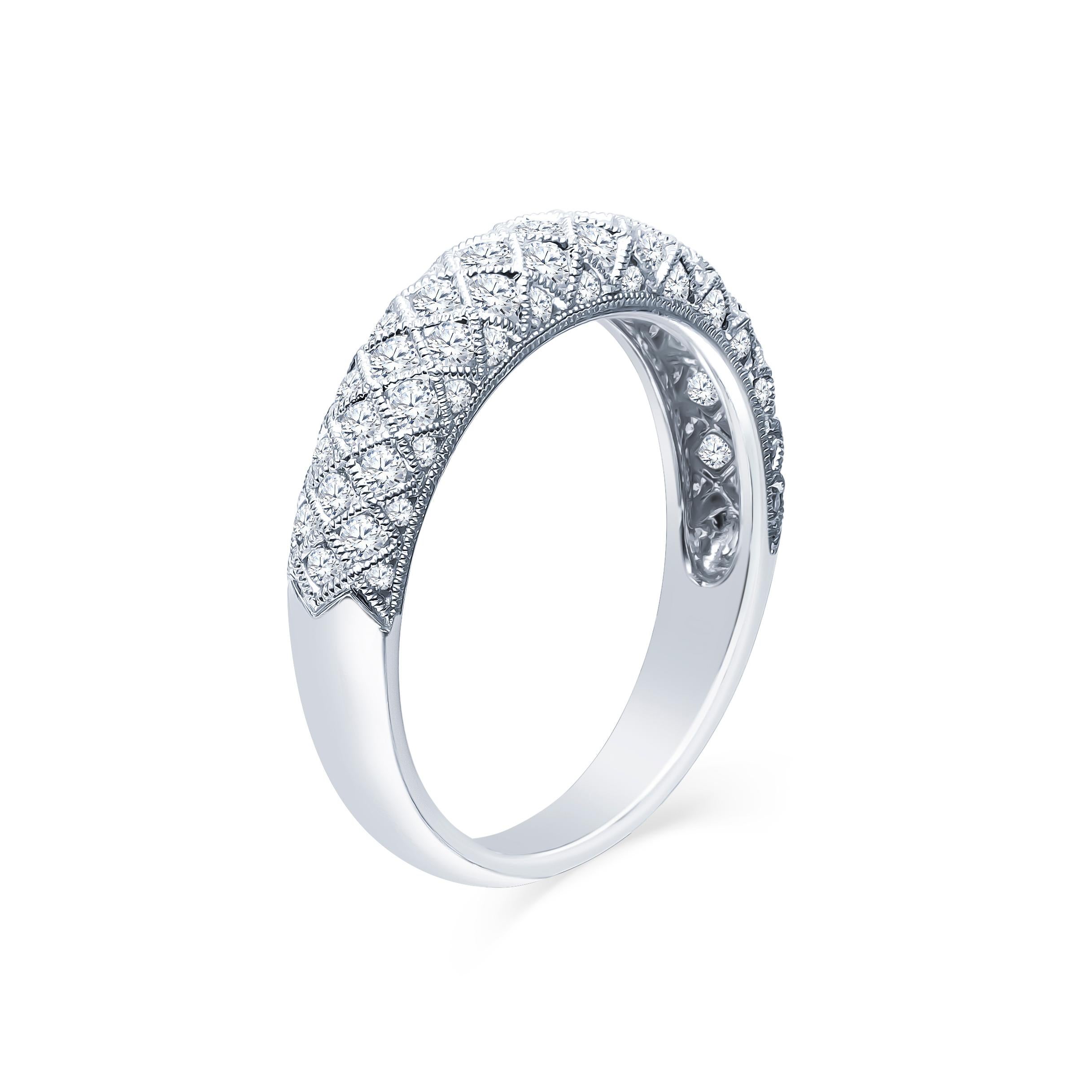 This intricately detailed women's 18K white gold band features four-side channel set white round diamonds with a combined weight of approximately 0.80 carats. The ring stands alone beautifully but would also be stunning stacked with narrow diamond