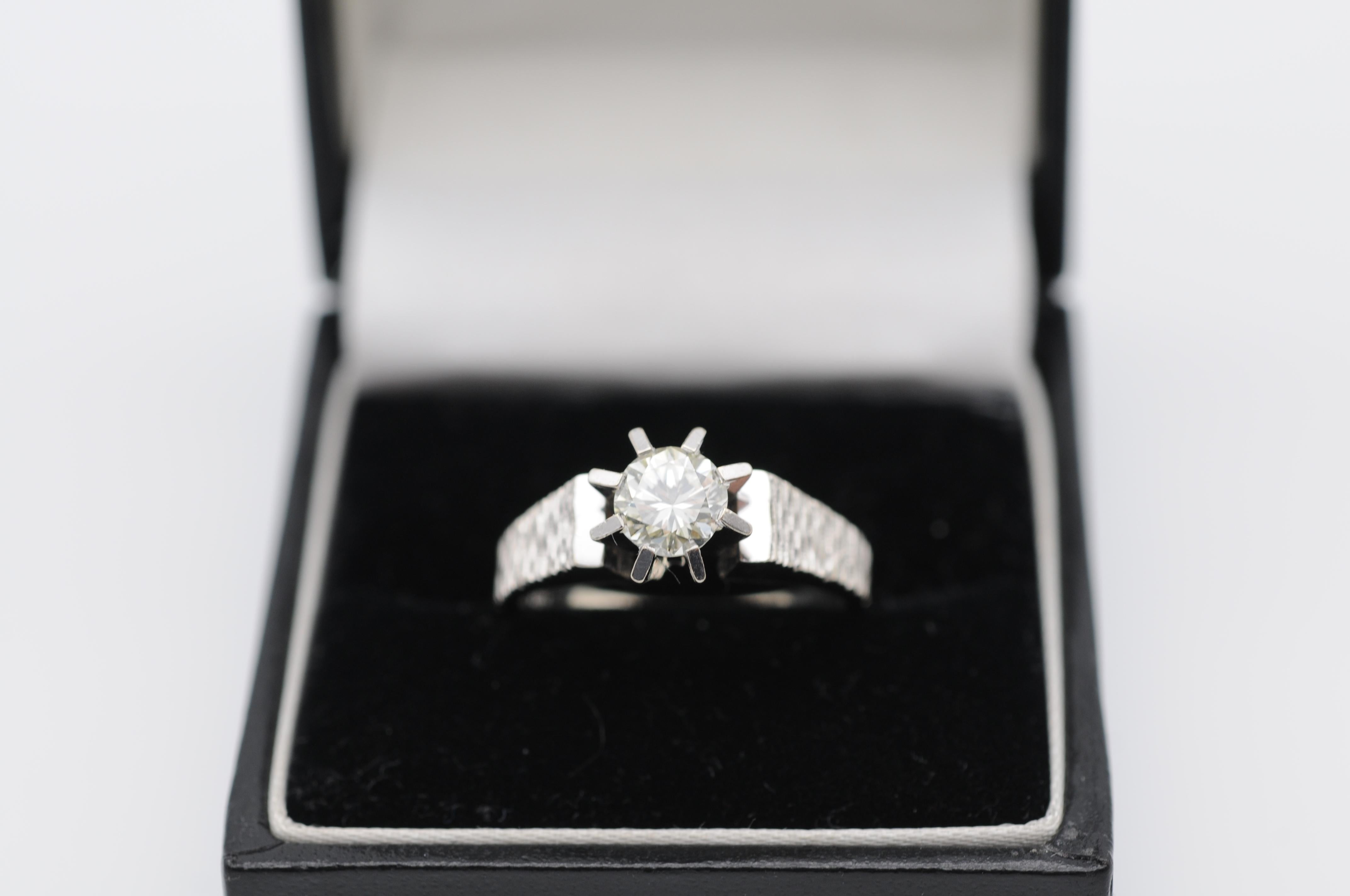 This magnificent 0.80 Ct. Solitaire Brilliant Ring in 14k Yellow Gold is the epitome of classic elegance. The stunning solitaire diamond sits majestically atop the high applied setting, its brilliance and fire accentuated by the warm glow of the 14k