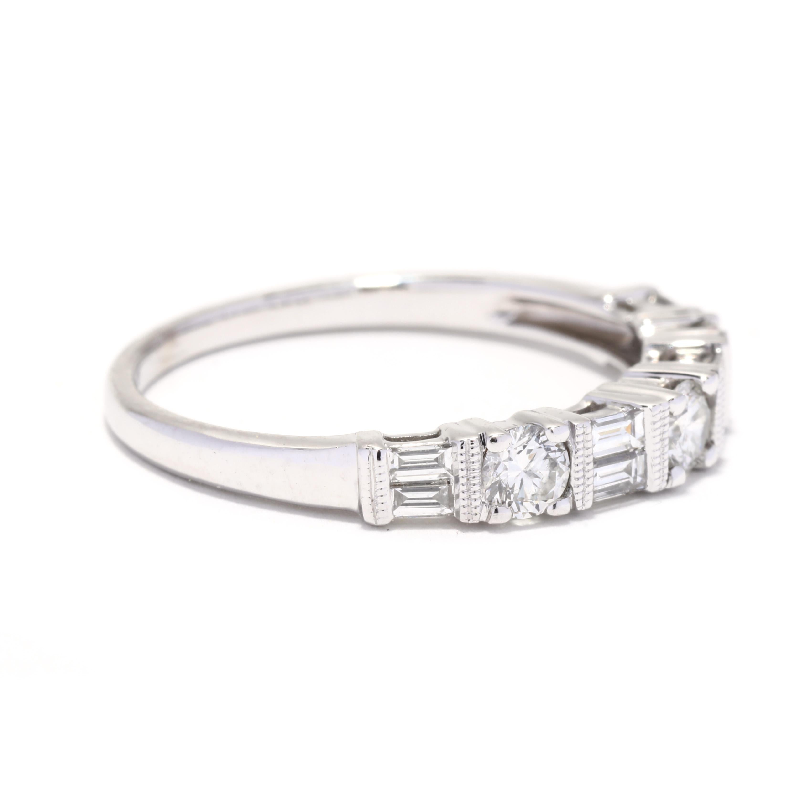 A vintage 14 karat white gold baguette and round brilliant cut diamond stackable band ring. This ring features alternating round brilliant cut and baguette cut diamonds weighing approximately .80 total carats and with a thin tapered band.

Stones:
-