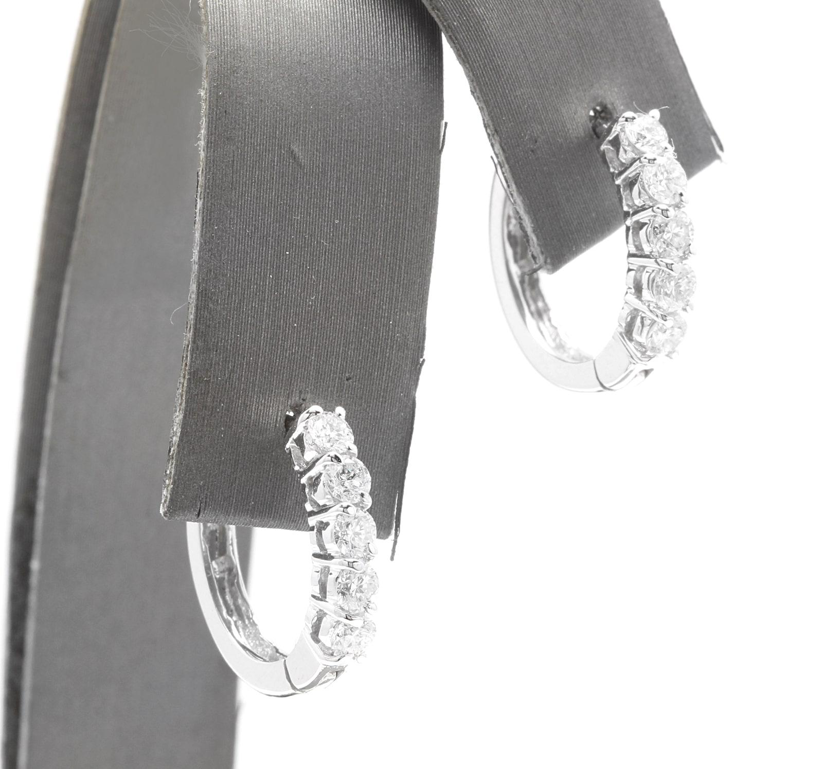 Exquisite 0.80 Carats Natural Diamond 14K Solid White Gold Hoop Earrings

Amazing looking piece! 

Suggested Replacement Value $3,500.00

Total Natural Round Cut White Diamonds Weight: Approx. 0.80 Carats (color G-H / Clarity SI1-SI2)

Total