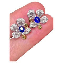 0.80ct Sapphire
0.50ct White Diamond 18k White
Yellow Gold Stud Earrings