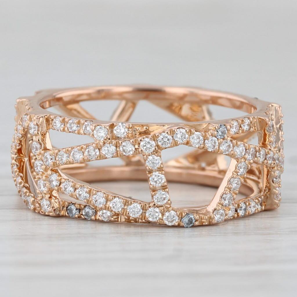 Gemstone Information:
- Natural Diamonds -
Total Carats - 0.80ctw
Cut - Round Brilliant
Color - E - F
Clarity - VS2

Metal: 18k Rose Gold
Weight: 5.5 Grams 
Stamps: 750
Rise Above Finger: 2.6 mm
Band / Shank Width: 8.1 mm

This ring is a size 6 3/4.
