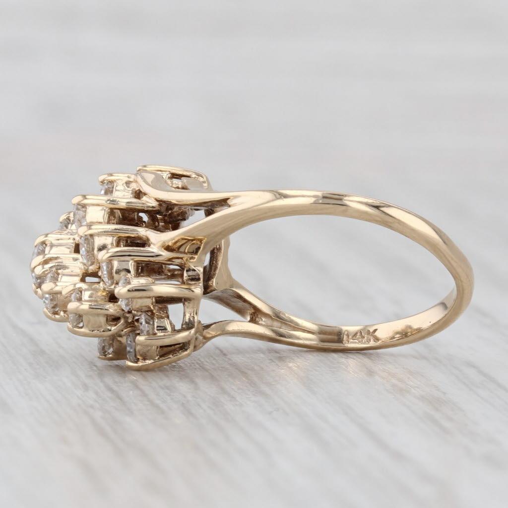 Gemstone Information:
- Natural Diamonds -
Total Carats - 0.80ctw
Cut - Round Brilliant
Color - H - I
Clarity - SI1 - I1

Metal: 14k Yellow Gold
Weight: 4.3 Grams 
Stamps: 14k
Face Height: 15 mm 
Rise Above Finger: 10.8 mm
Band / Shank Width: 1.7