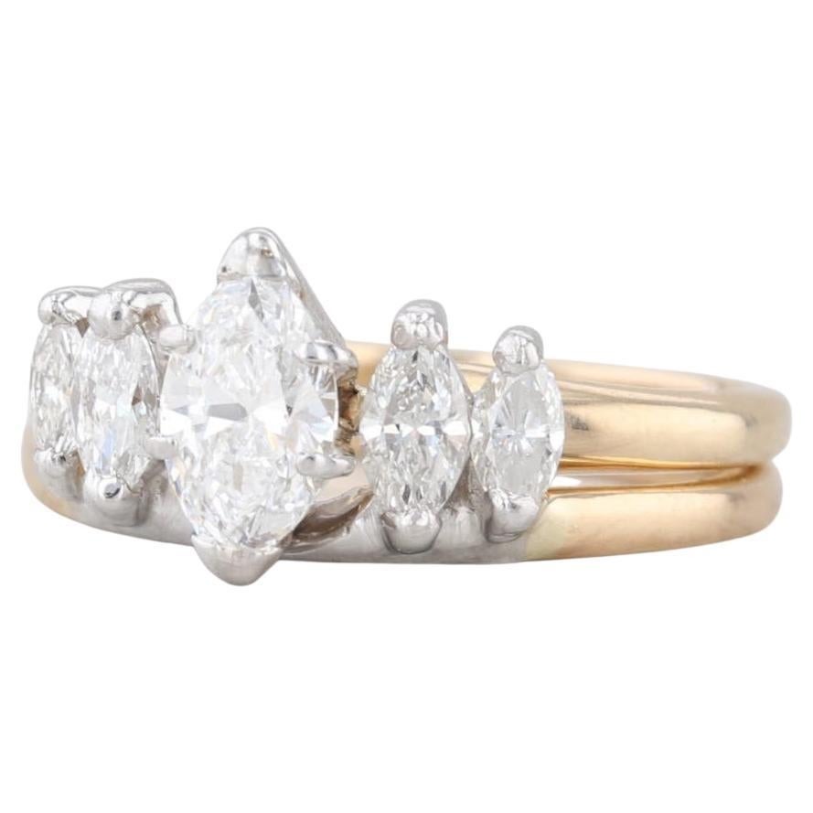 Anello di fidanzamento con diamante marquise da 0,80 ct. Anello nuziale in oro 14 ct.