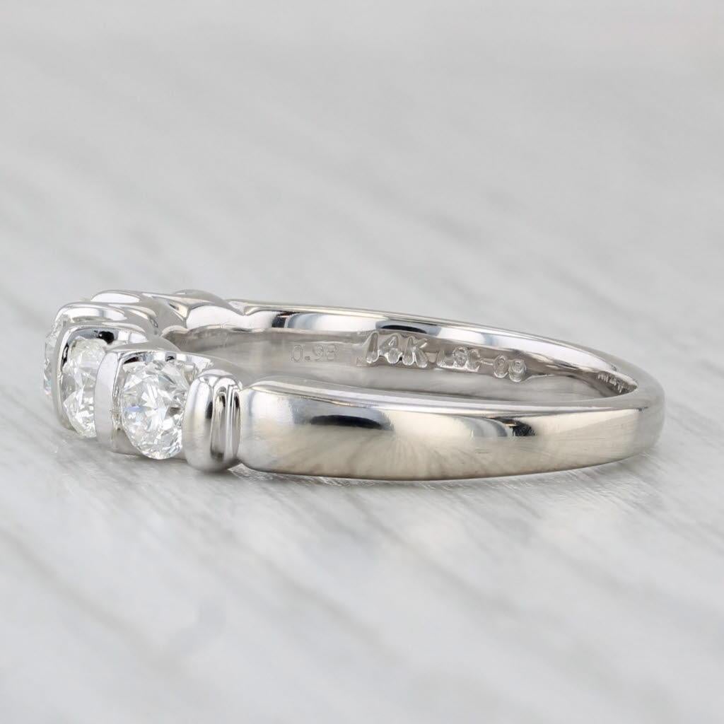 Gemstone Information:
- Natural Diamonds -
Total Carats - 0.80ctw
Cut - Round Brilliant
Color - I - J
Clarity - VS2
Inscription - LEO 5148895

Metal: 14k White Gold 
Weight: 4.7 Grams 
Stamps: 14k LEO
Face Height: 4.1 mm 
Rise Above Finger: 4.4