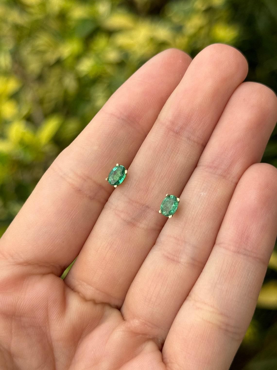 Modern 0.80tcw 14K Petite Oval Emerald Stud Earrings Four Prong Baby Studs Green For Sale