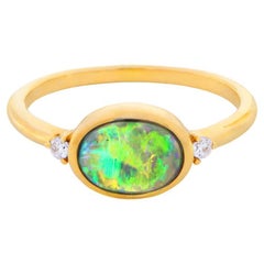 0.81 Carat Australian Crystal Opal and 18k Gold Ring