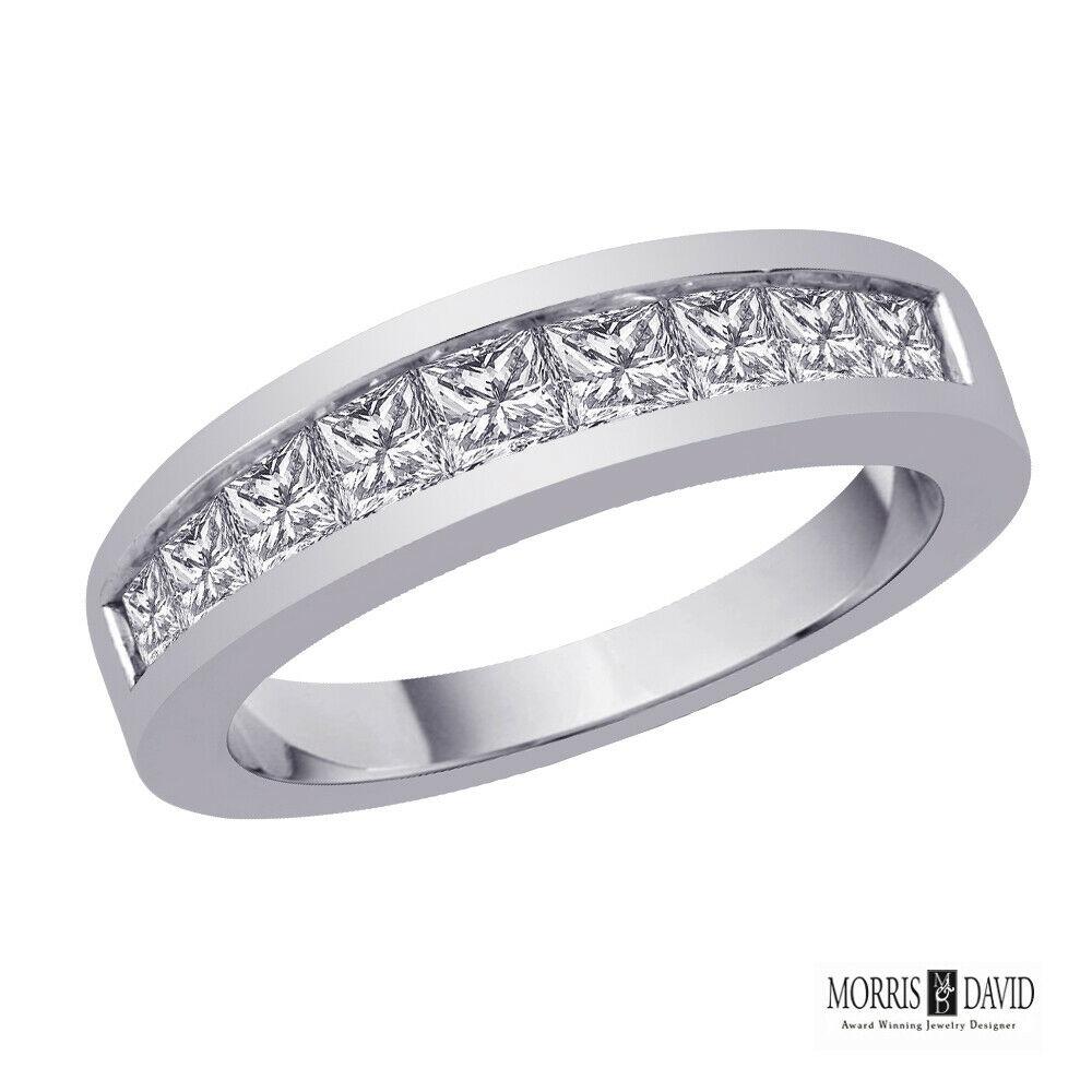 0.81 Carat Natural Princess Cut Diamond Band Ring G SI 14K White Gold 

100% Natural Diamonds, Not Enhanced in any way Princess Cut Diamond Ring
0.81CT
G-H 
SI  
14K White Gold,  Channel style,   3.9 grams
3.5 mm in width
Size 7
9