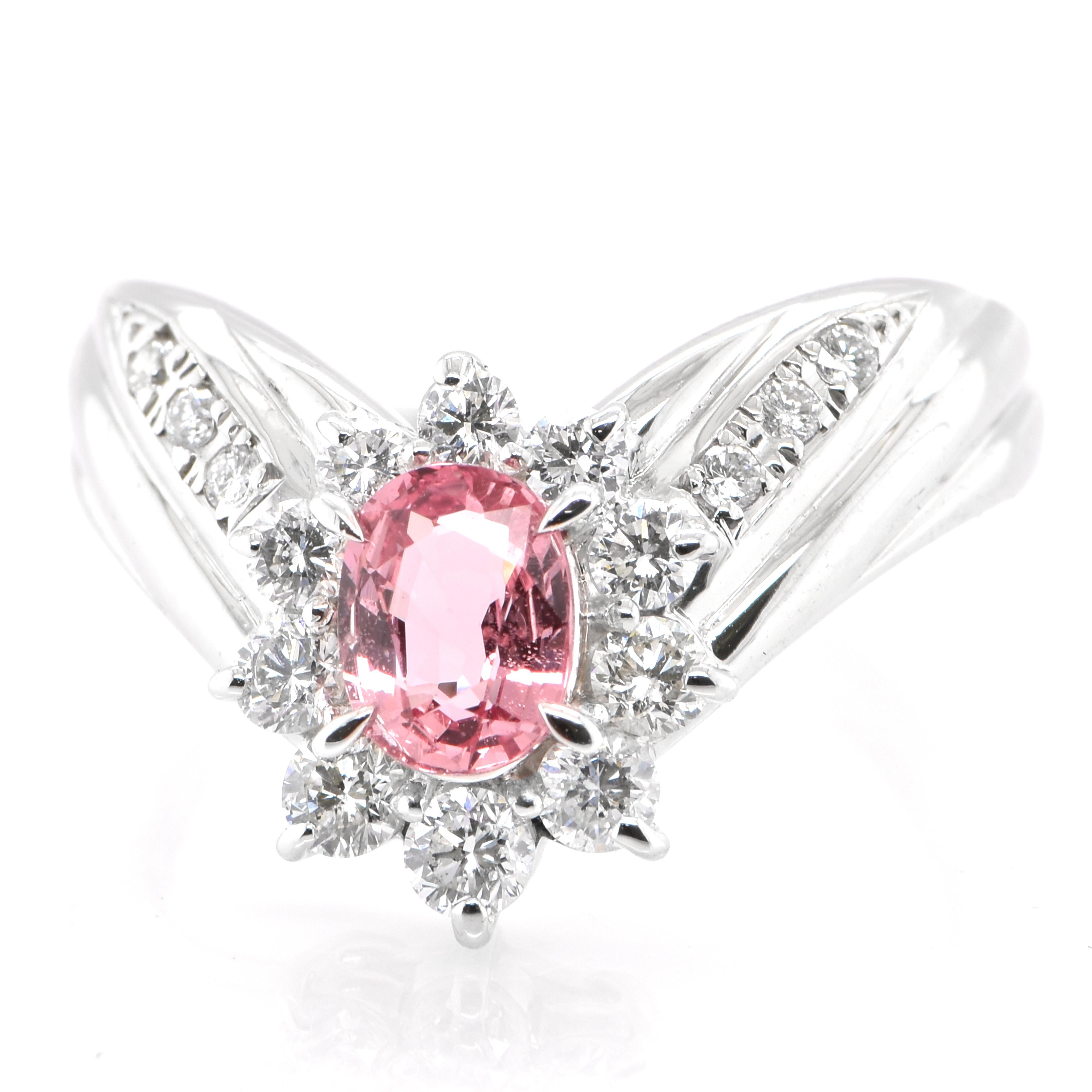 A beautiful ring featuring a 0.817 Carat, Natural Padparadscha Sapphire and 0.62 Carats of Diamond Accents set in Platinum. Sapphires have extraordinary durability - they excel in hardness as well as toughness and durability making them very popular