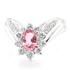 0.81 Carat Natural Padparadscha Sapphire and Diamond Ring Set in Platinum