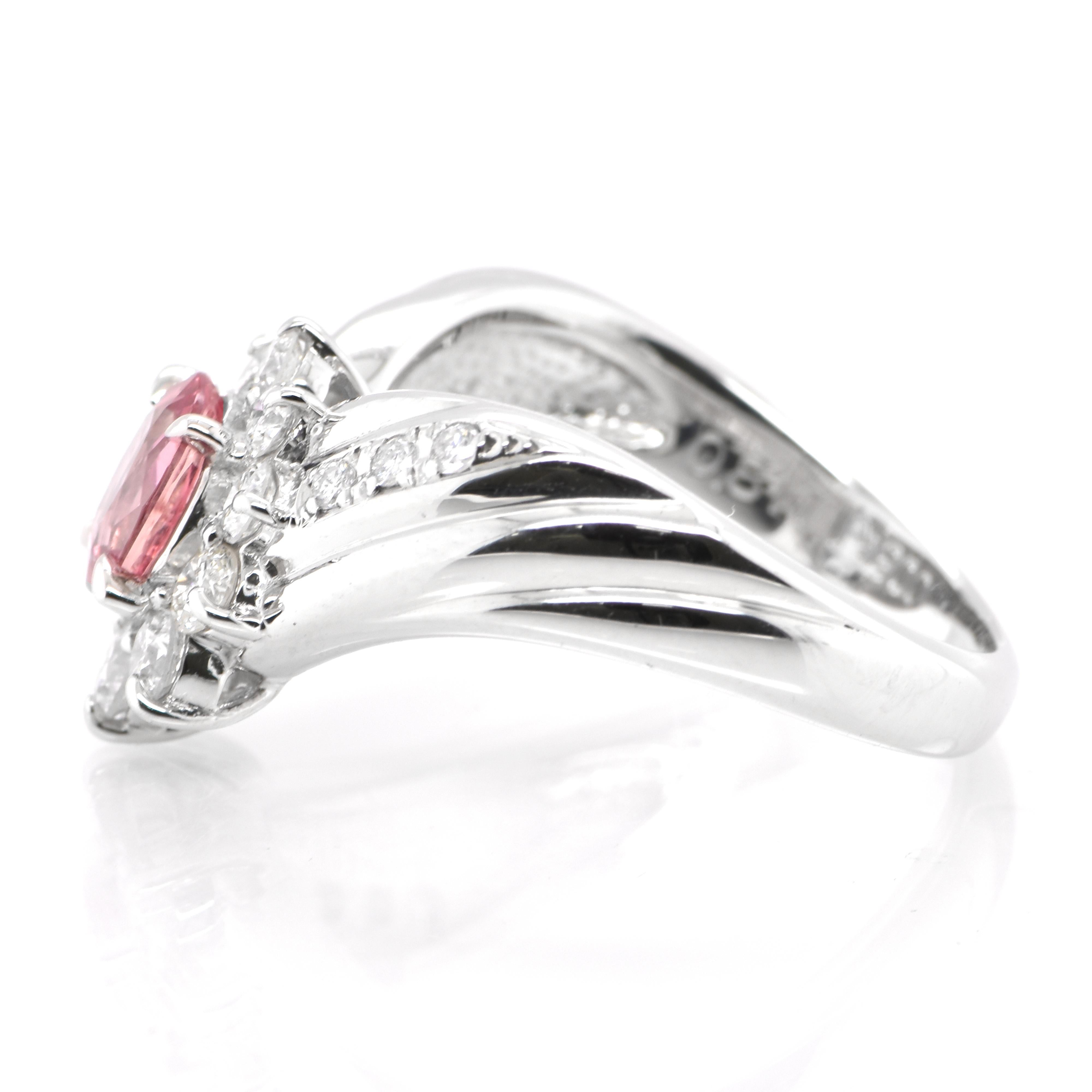 Modern 0.81 Carat Natural Padparadscha Sapphire and Diamond Ring Set in Platinum For Sale