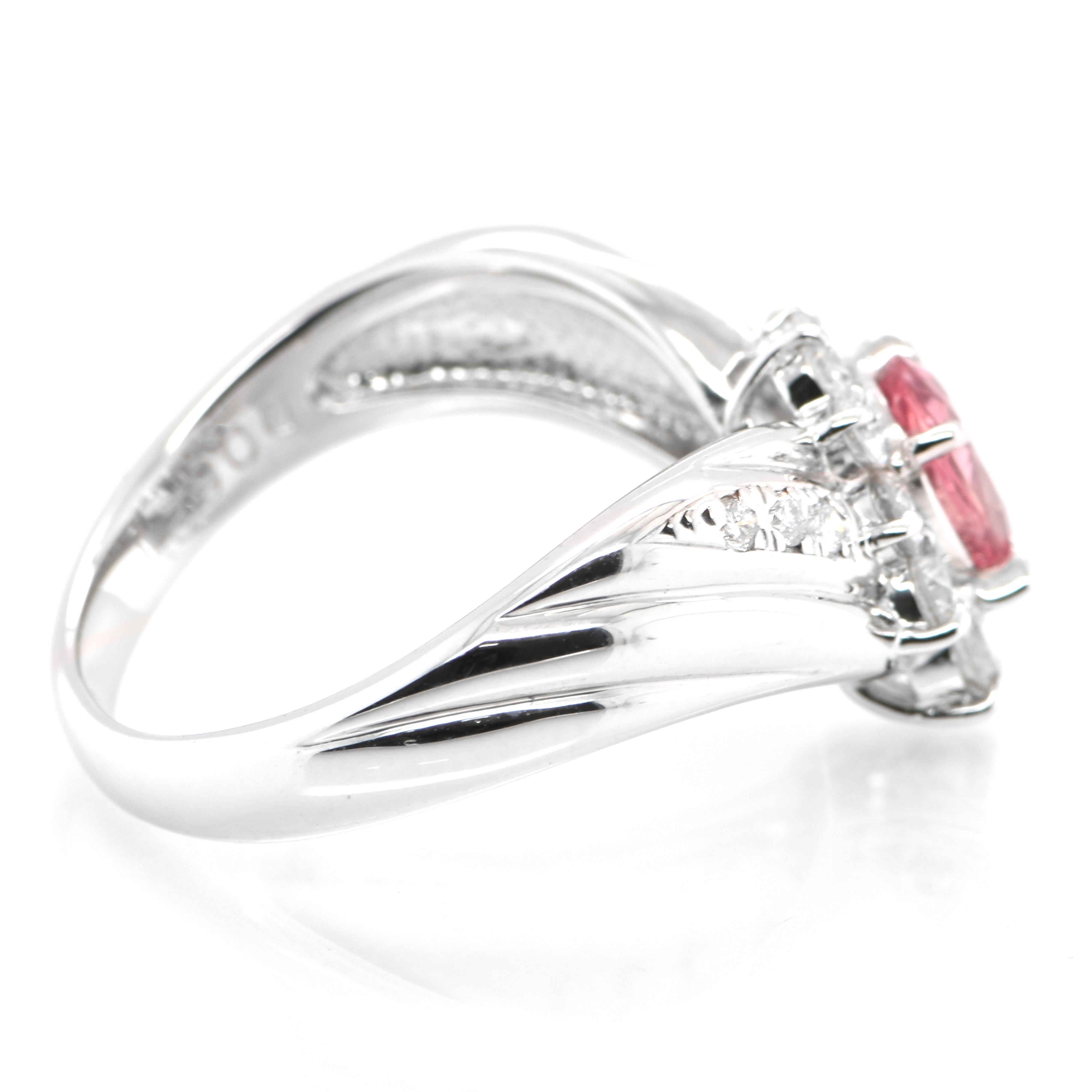 Oval Cut 0.81 Carat Natural Padparadscha Sapphire and Diamond Ring Set in Platinum For Sale