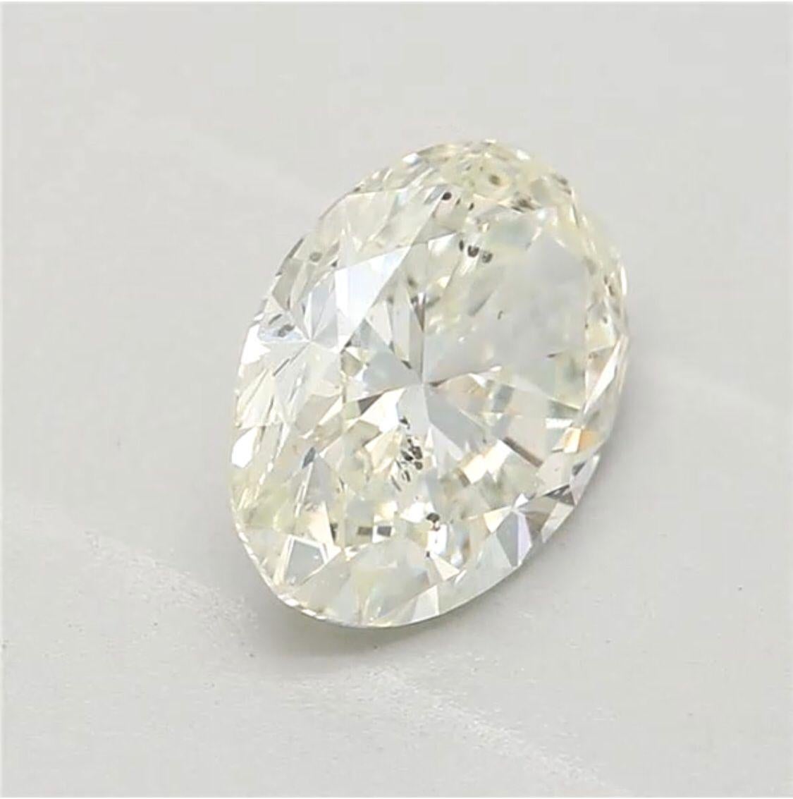 Oval Cut 0.81 Carat Very Light Yellow Green Oval cut diamond SI2 Clarity GIA Certified For Sale