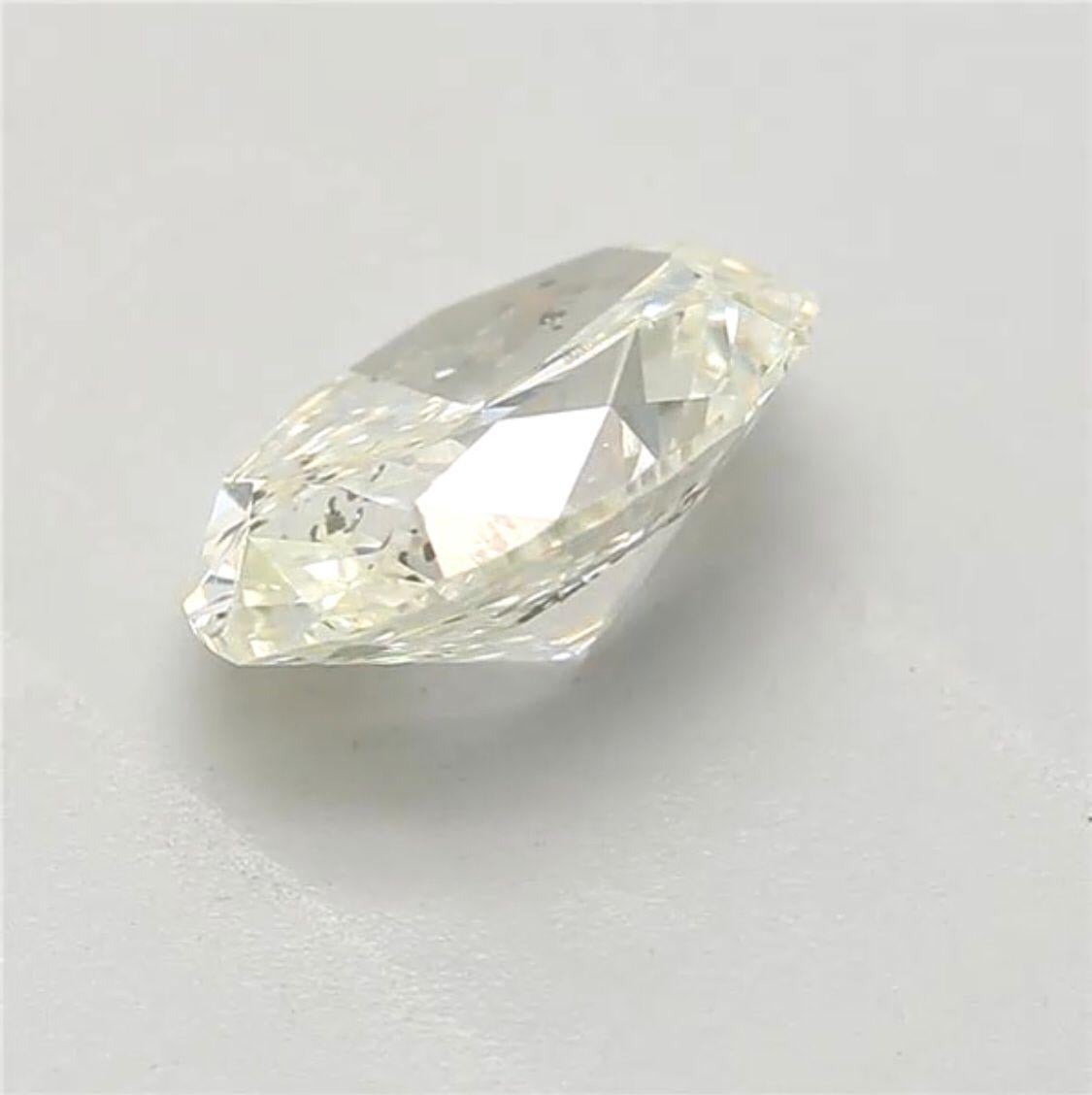 Women's or Men's 0.81 Carat Very Light Yellow Green Oval cut diamond SI2 Clarity GIA Certified For Sale
