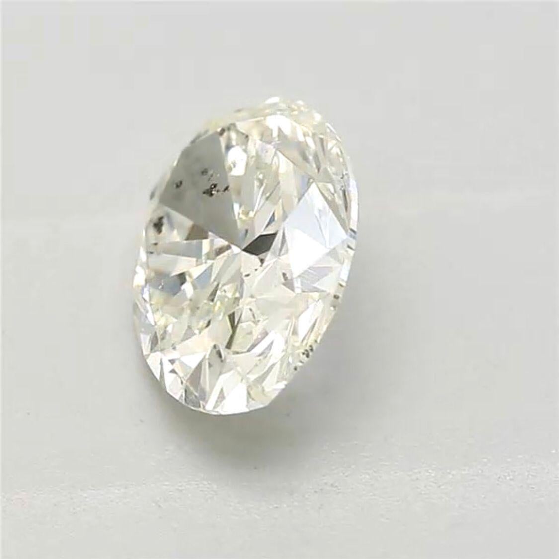 0.81 Carat Very Light Yellow Green Oval cut diamond SI2 Clarity GIA Certified For Sale 1