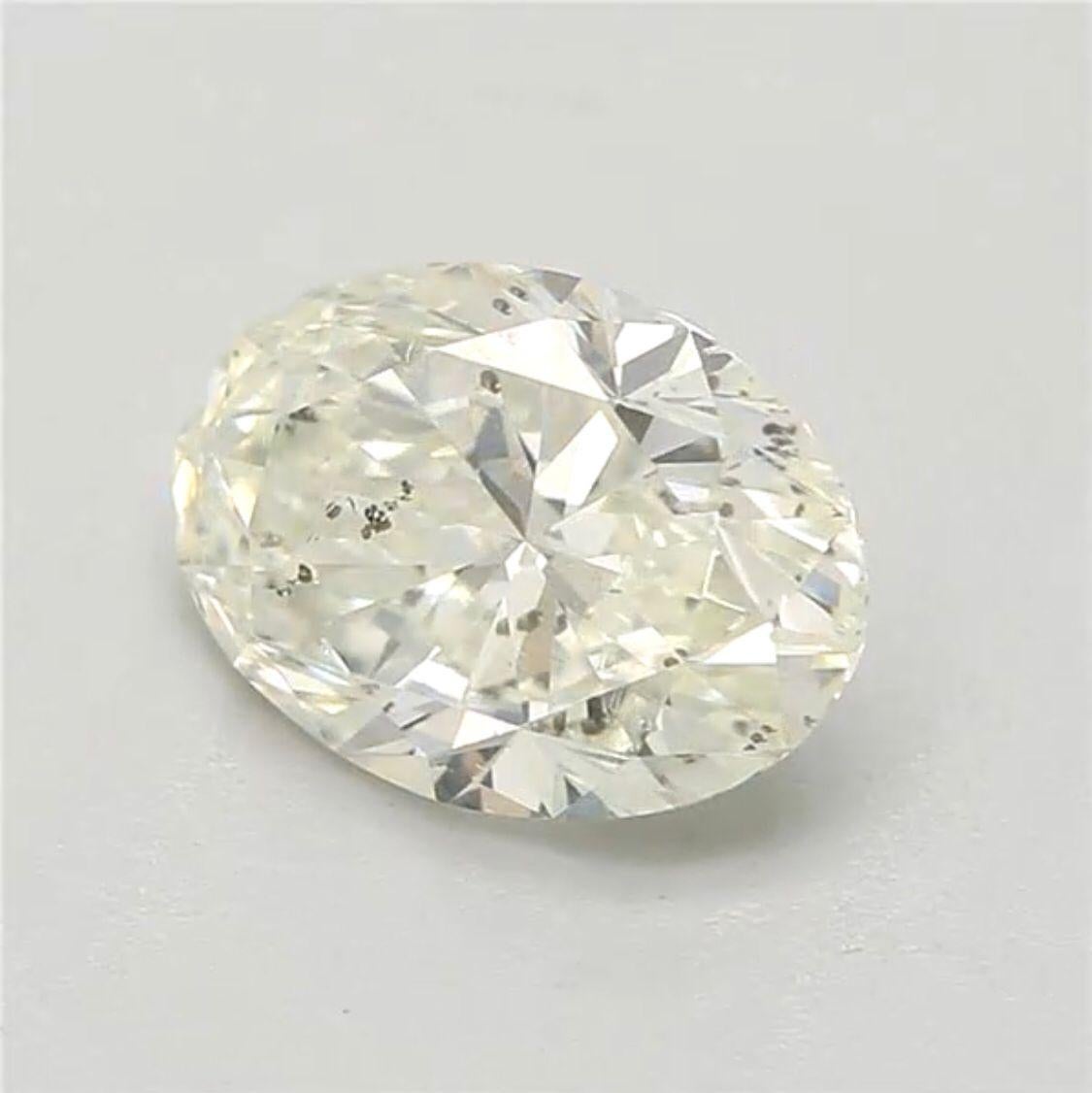 0.81 Carat Very Light Yellow Green Oval cut diamond SI2 Clarity GIA Certified For Sale 2