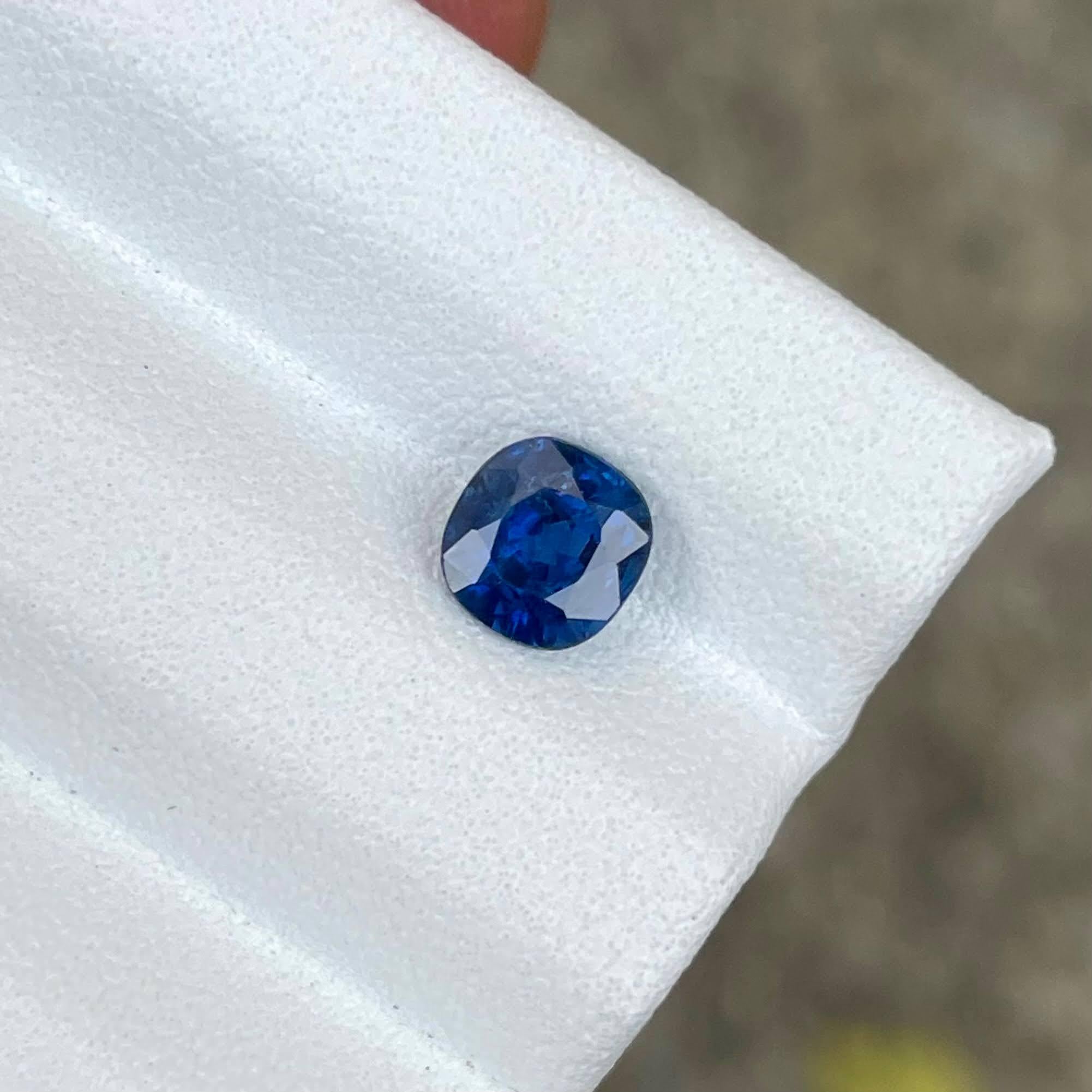 Weight 0.81 carats 
Dimensions 5.4x5.2x3.4 mm
Treatment heated 
Origin Sri Lanka 
Clarity SI
Shape cushion 
Cut fancy cushion



This exquisite 0.81 carat blue sapphire is a natural gemstone hailing from the renowned mines of Sri Lanka, a region