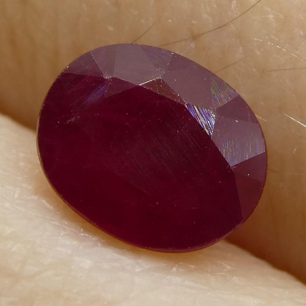 Description:

Gem Type: Ruby
Number of Stones: 1
Weight: 0.81 cts
Measurements: 6.05x4.95x2.83 mm
Shape: Oval
Cutting Style Crown: Modified Brilliant
Cutting Style Pavilion: Step Cut
Transparency: Translucent
Clarity: Moderately Included: Inclusions