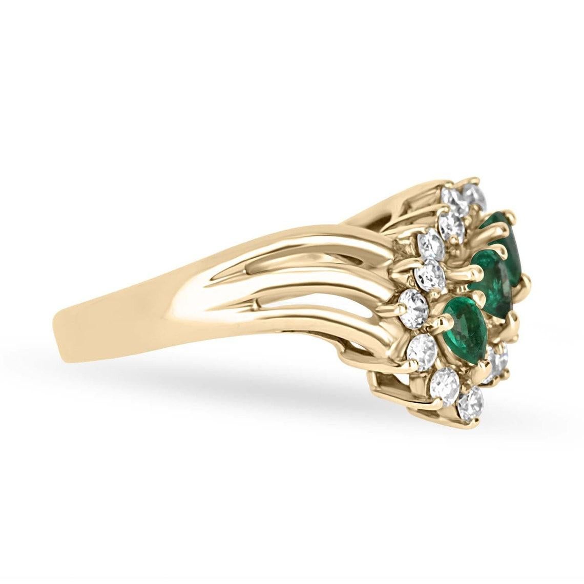 Displayed is a magnificent 3/4tcw natural Colombian emerald and diamond statement/right-hand ring. Three, pear emerald gemstones are delicately placed in the center of the ring and portray the most beautiful green color. The emeralds have excellent