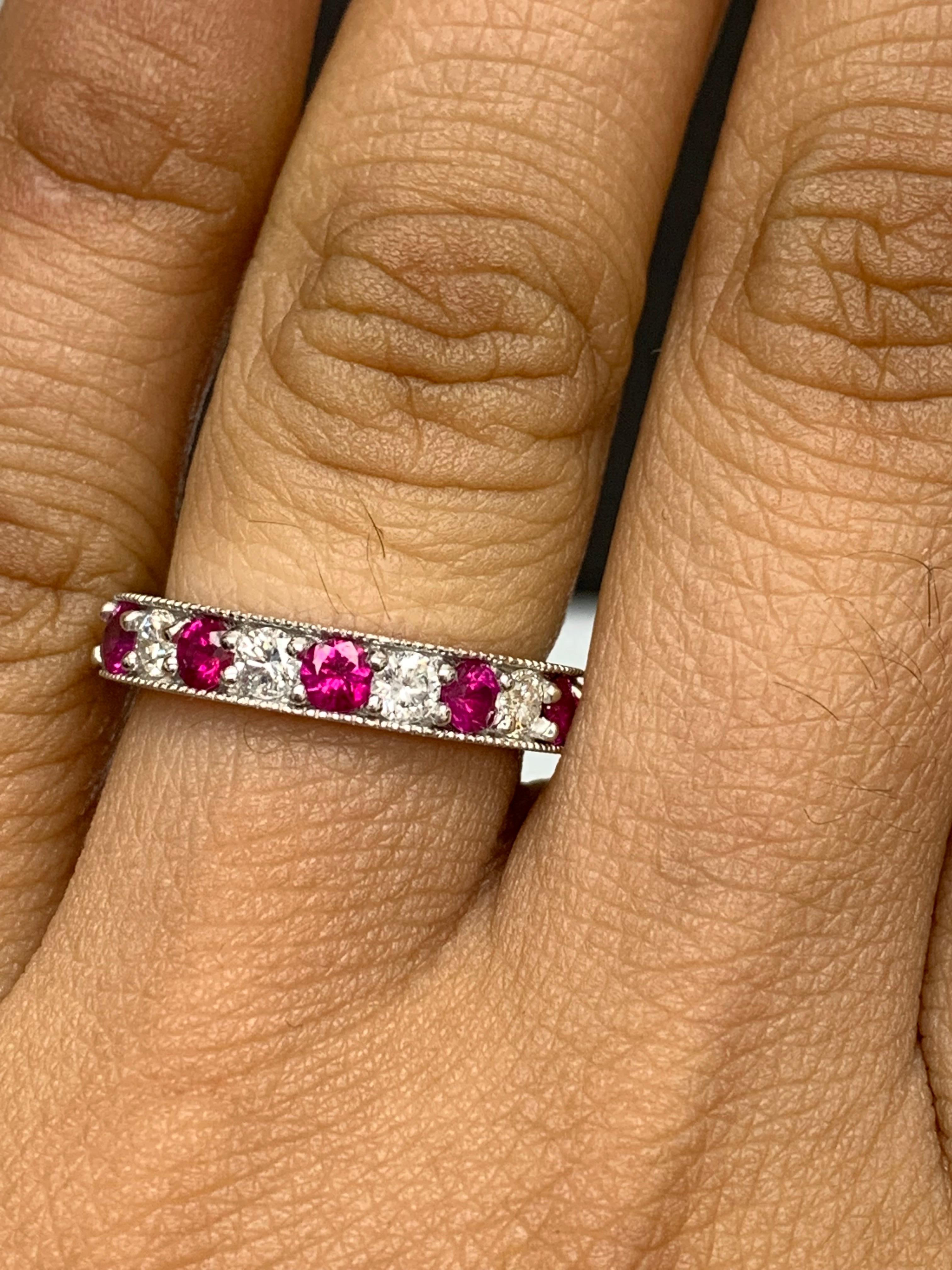 Handcrafted to perfection; showcasing color-rich brilliant-cut rubies that elegantly alternate brilliant-cut diamonds in a 14k white gold setting. 
The 6 Rubies weigh 0.82 carats total and 5 diamonds weigh 0.50 carats total.

Size 6.5 US (Sizable).