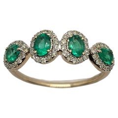 0.82 Carat Colombian Emerald Gold Ring with Natural Diamonds Halo