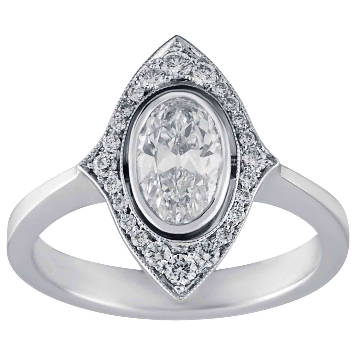 0.82 Carat Old Cut Oval Solitaire Diamond Ring in 18 Karat White Gold For Sale