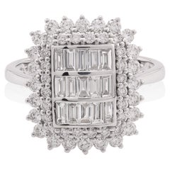 0.82 carats of round diamonds with 0.60 carats of baguette Ring in 18 Karat Gold