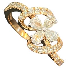 Bague de fiançailles en or rose 14 carats F/VS1 diamants taille ronde brillants poire 0,82 carat