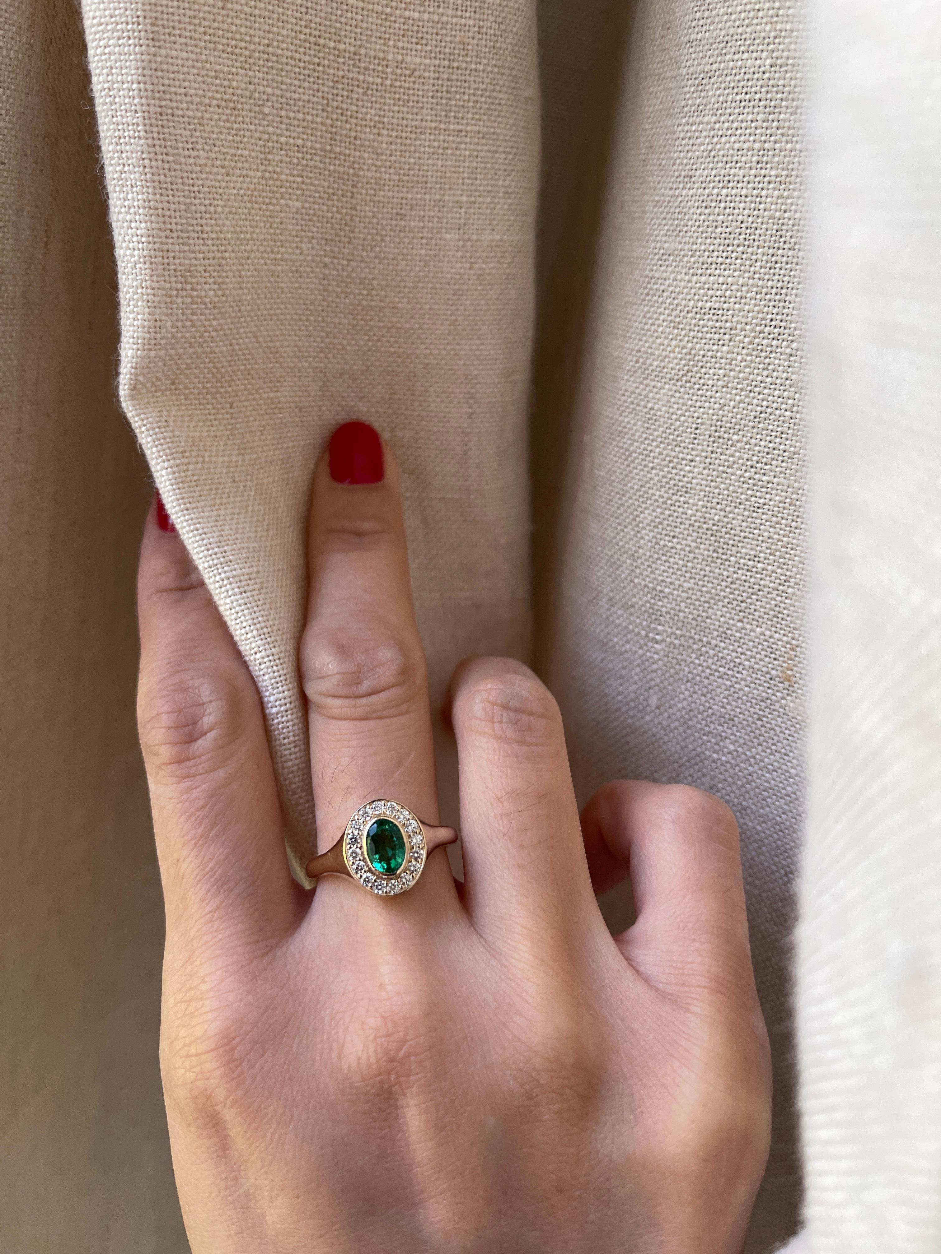 Metal: 14K Yellow Gold
Stone: Zambian Natural Emerald
Stone Size: 5 mm x 6 mm
Stone Shape: Oval
Stone Weight: 0.825 carat
Accent Stones: Natural Diamond
Accent Stone Sizes: 1.5mm
Accent Stone Weight: 0.2 total carat weight
Dimension: 3mm band
