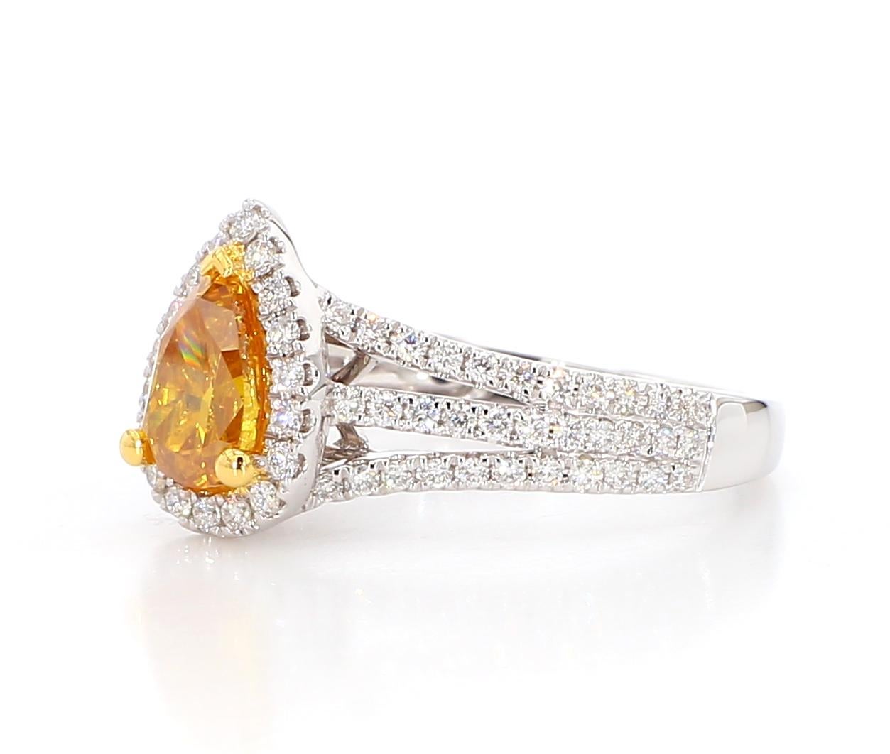 Ein seltener Fancy-Diamant für Sammler: Dieser 0,83 Karat schwere Fancy Vivid Yellow-Orange Diamond Ring ist ein Zeugnis für feine Handwerkskunst und zeitloses Design. Dieser Ring ist perfekt für alle, die die Schönheit natürlicher Diamanten zu