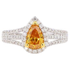 0.83 Carat Fancy Vivid Yellow-Orange Pear Shape Diamond Ring [GIA#1156549673]