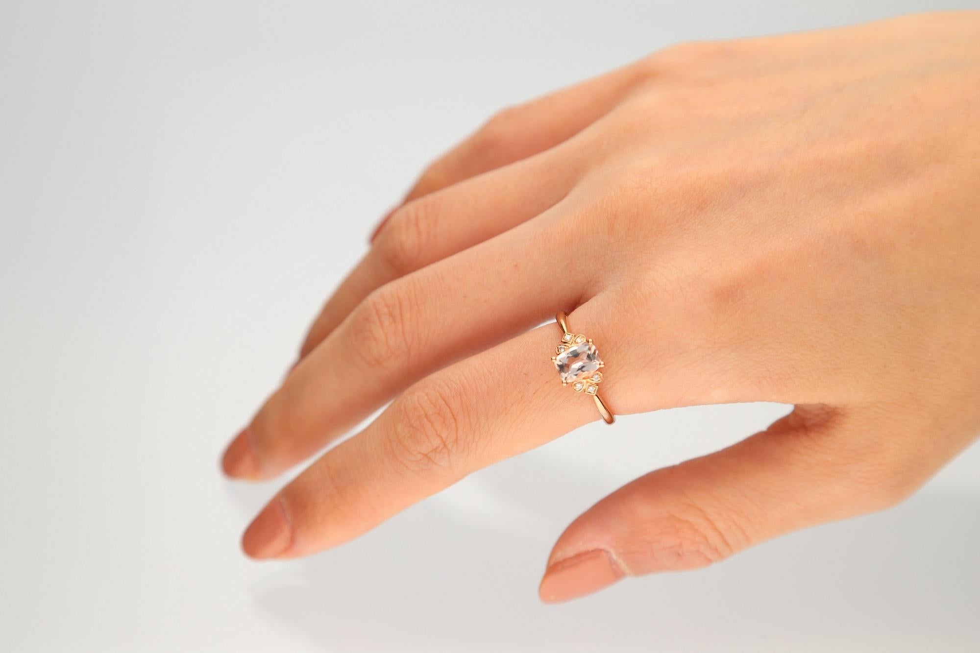 Stunning, timeless and classy eternity Unique ring. Decorate yourself in luxury with this Gin & Grace ring. The 10K Rose Gold jewelry boasts Cushion-Cut Prong Setting Genuine Morganite (1pcs) 0.83 Carat and Round-Cut Prong Setting Diamond (6 pcs)