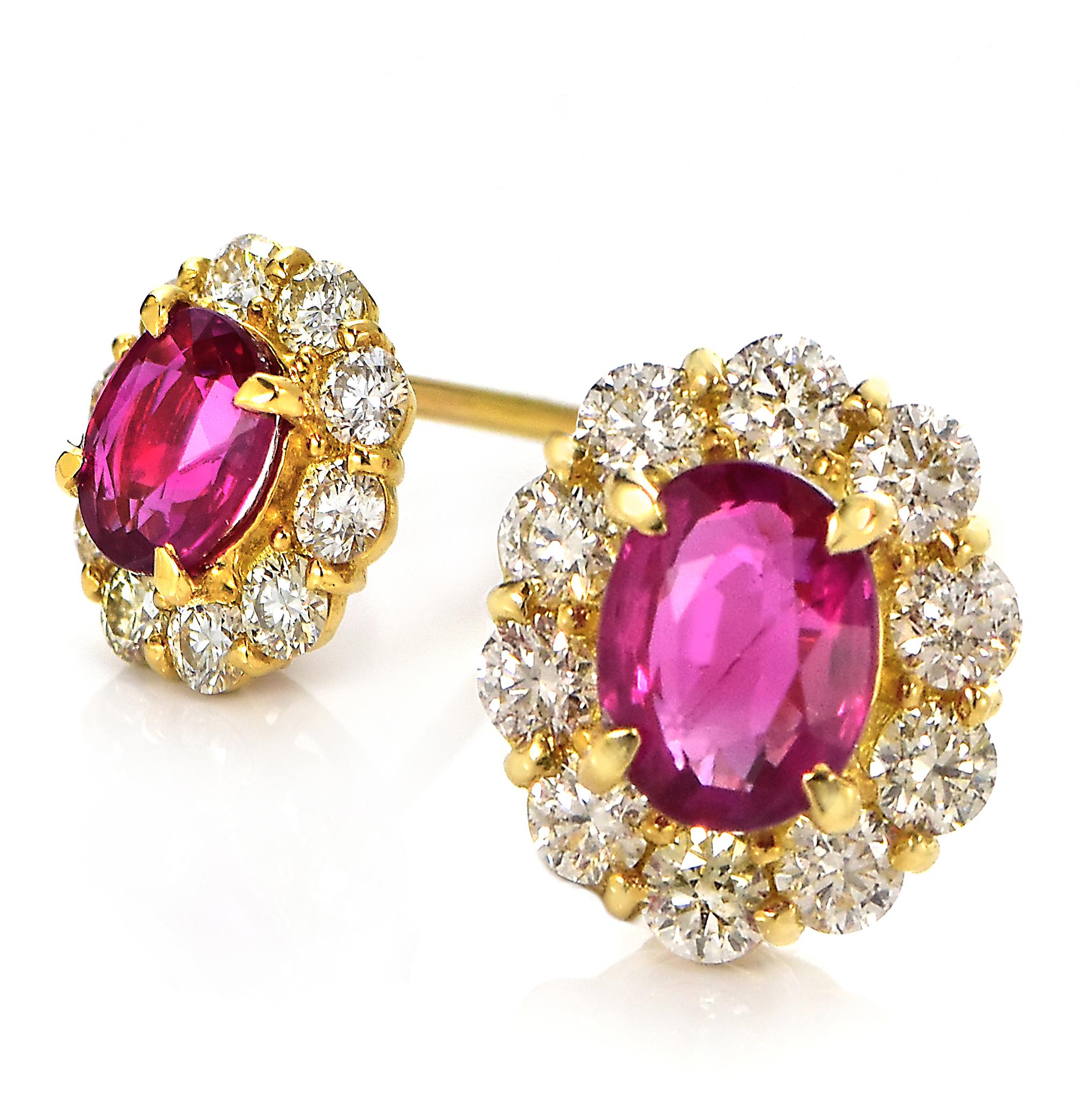 A beautiful pair of stud earrings set in 18 Karat Yellow Gold featuring a total of 0.83 Carats Natural Rubies from Burma and 0.50 Carat Diamonds. Rubies are referred to as 