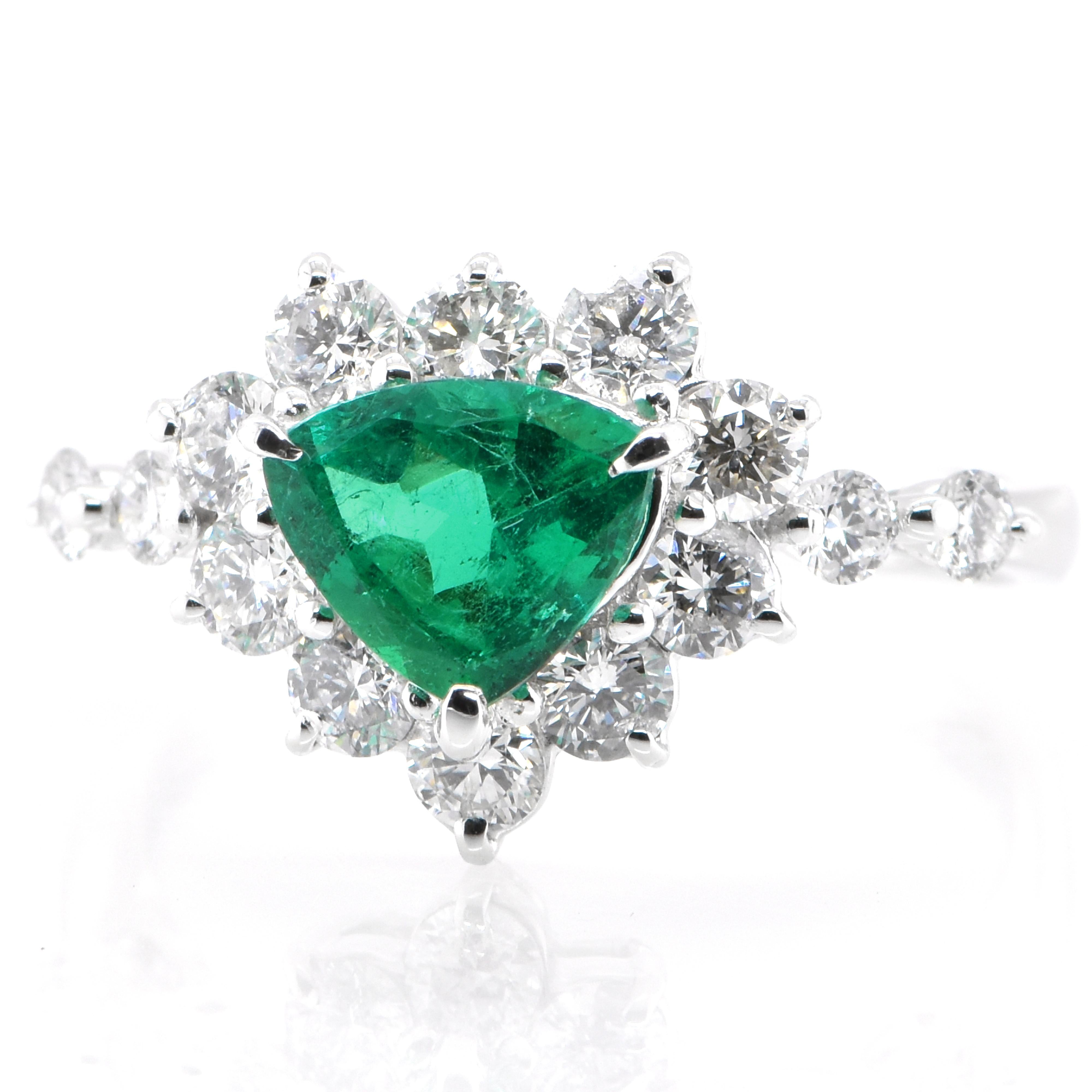 A stunning ring featuring a 0.83 Carat Natural Emerald and 0.90 Carats of Diamond Accents set in Platinum. People have admired emerald’s green for thousands of years. Emeralds have always been associated with the lushest landscapes and the richest