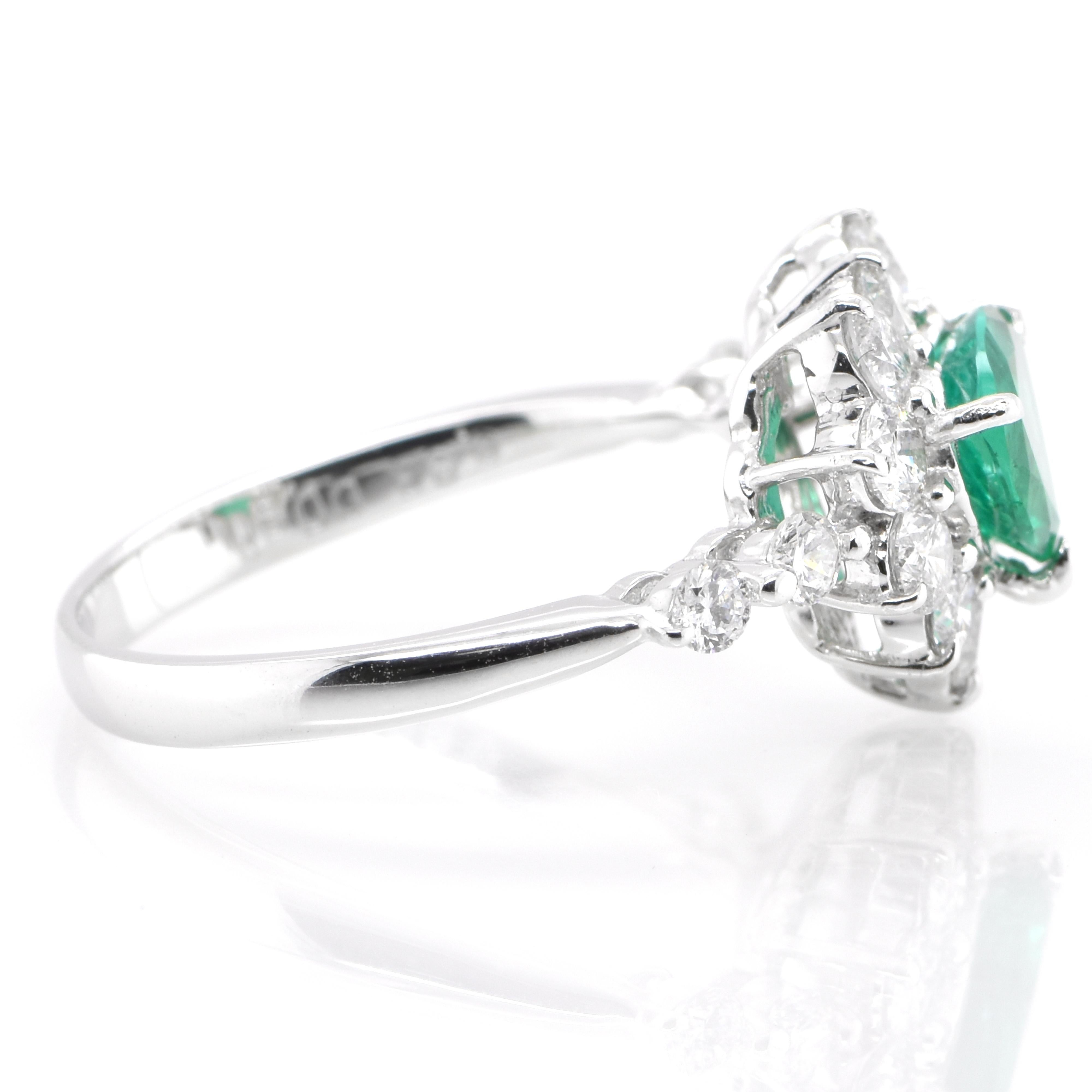Women's  0.83 Carat Natural, Trillion Cut Emerald and Diamond Ring Set in Platinum For Sale