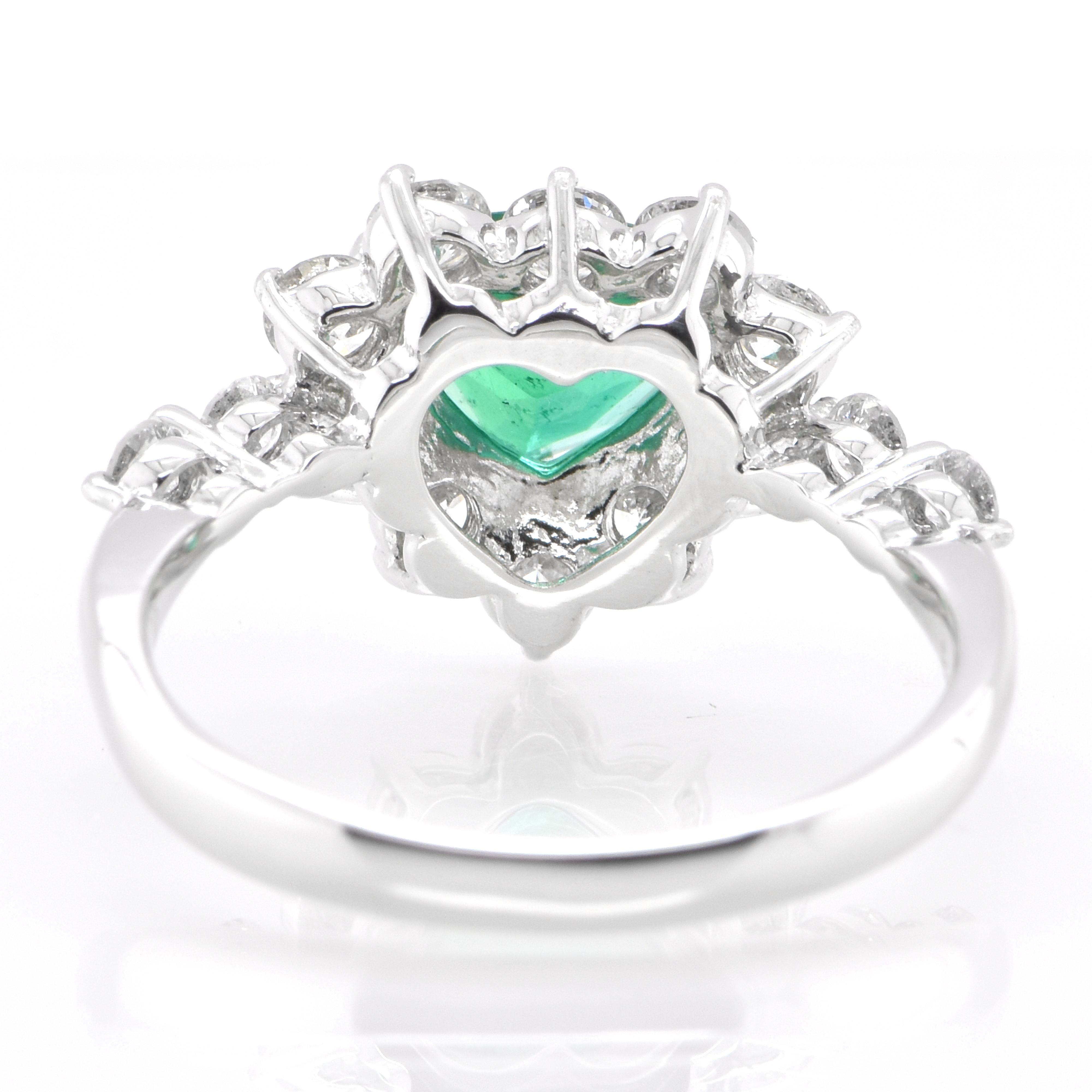 0.83 Carat Natural, Trillion Cut Emerald and Diamond Ring Set in Platinum 1
