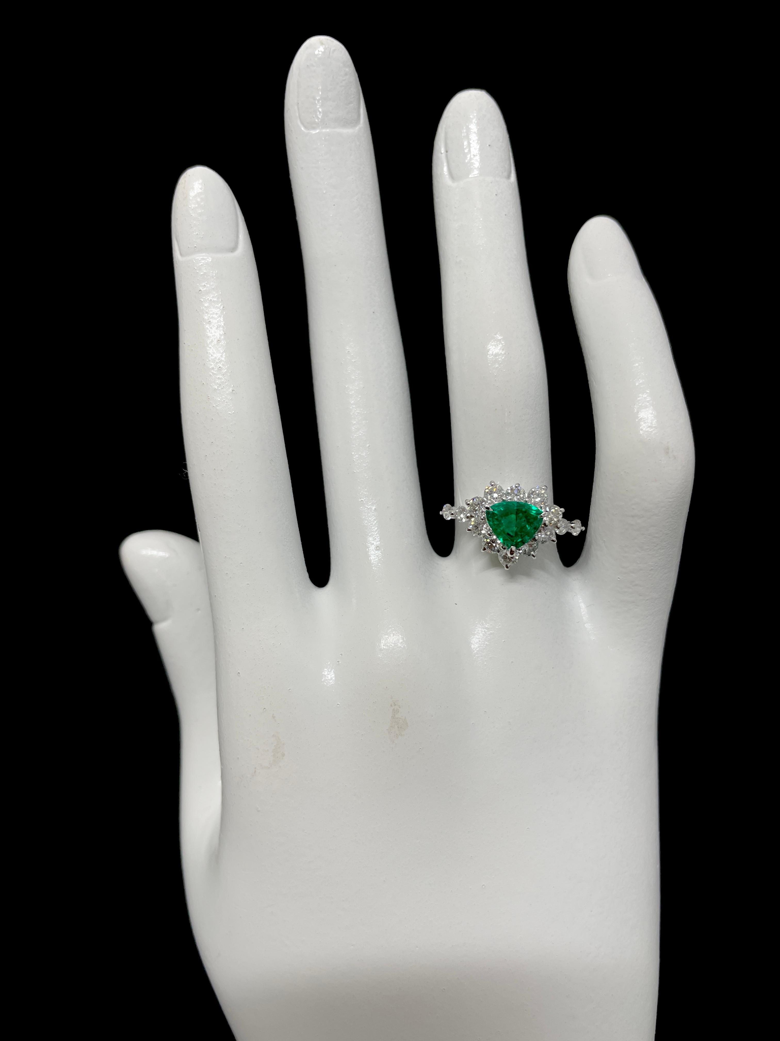 0.83 Carat Natural, Trillion Cut Emerald and Diamond Ring Set in Platinum 2