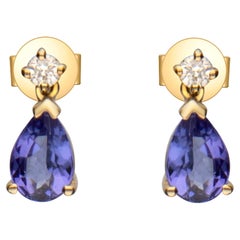 0.83 Carat Pear Cut Tanzanite Diamond Accents 14k Yellow Gold Earring