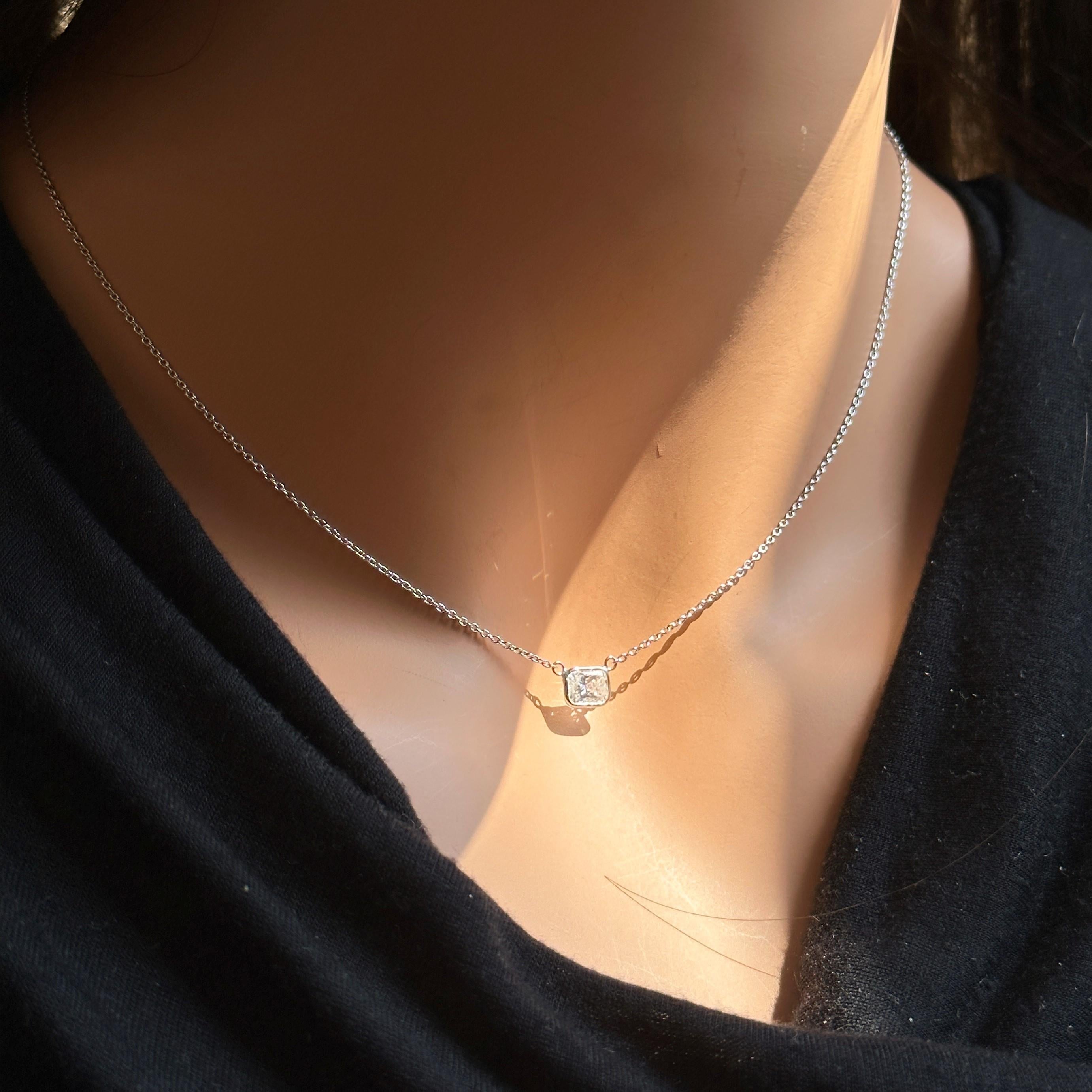 Make a statement worn solo and level up your collar candy when layered. How would you wear it? This is a natural Radiant, color F and clarity SI3, EGLUSA certified handmade necklace wire-wrapped in 14k white gold. This is a piece you'll wear