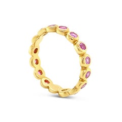 0.83 Carat Total Weight Round Pink Sapphire Bezel Set Eternity Band