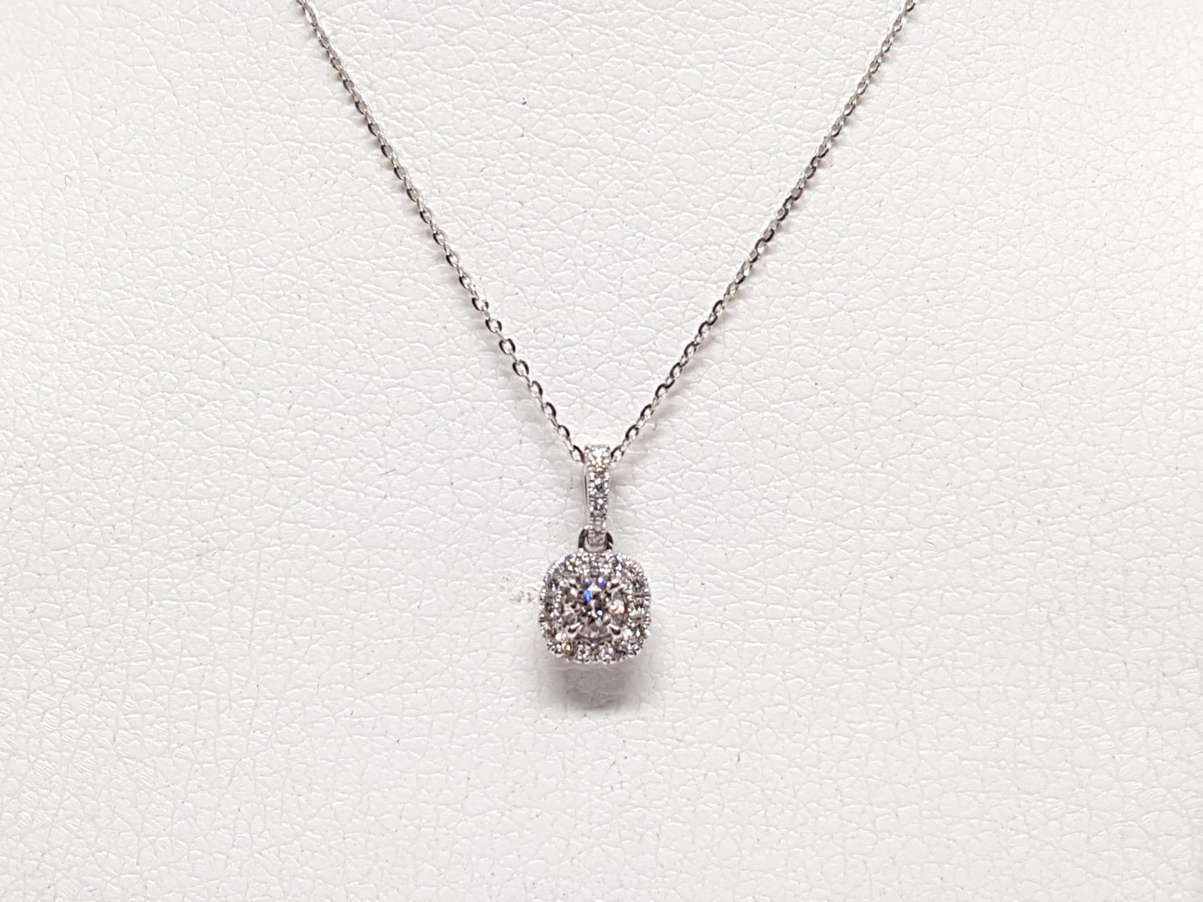 Gold: 18K White Gold. 
Weight: 1.87 gr. 
Center Diamonds 0.25ct. Colour: F Clarity: VS1 
Accent Diamond: 0.58ct. Colour: F Clarity: VS1 
Length Pendant: 1.40 cm. 
Width Pendant: 0.71 cm. 
Length chain: choose between 40, 42, 45cm. 
All our jewellery