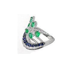 0.83 carats Emerald and 0.76 Sapphire ring
