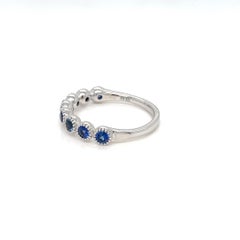 0.83 Carats Sapphire half eternity ring in Pave Bead setting
